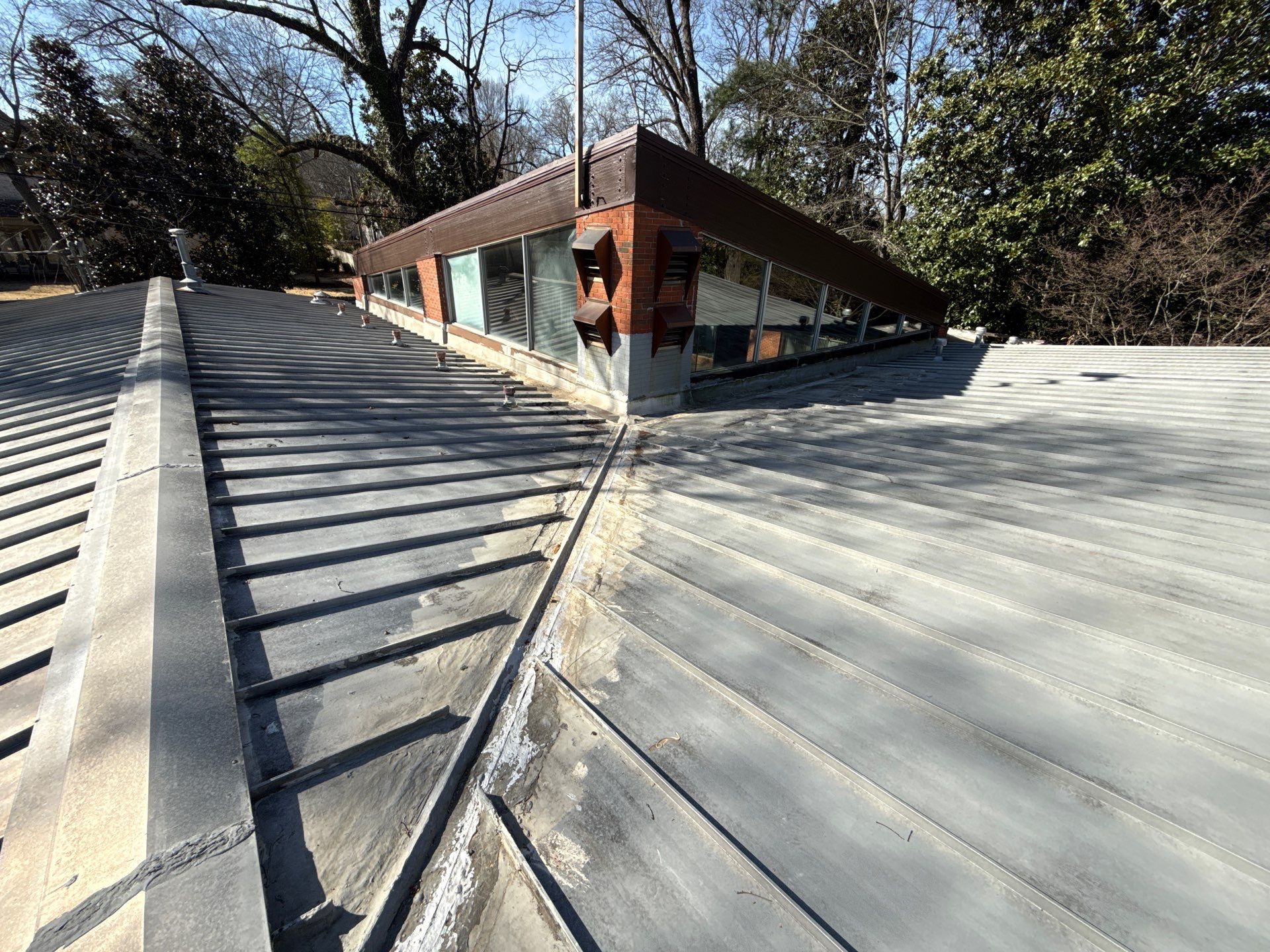 Residential Standing Seam Metal Roof and Membrane Replacement in Memphis by Revival Roofing Services