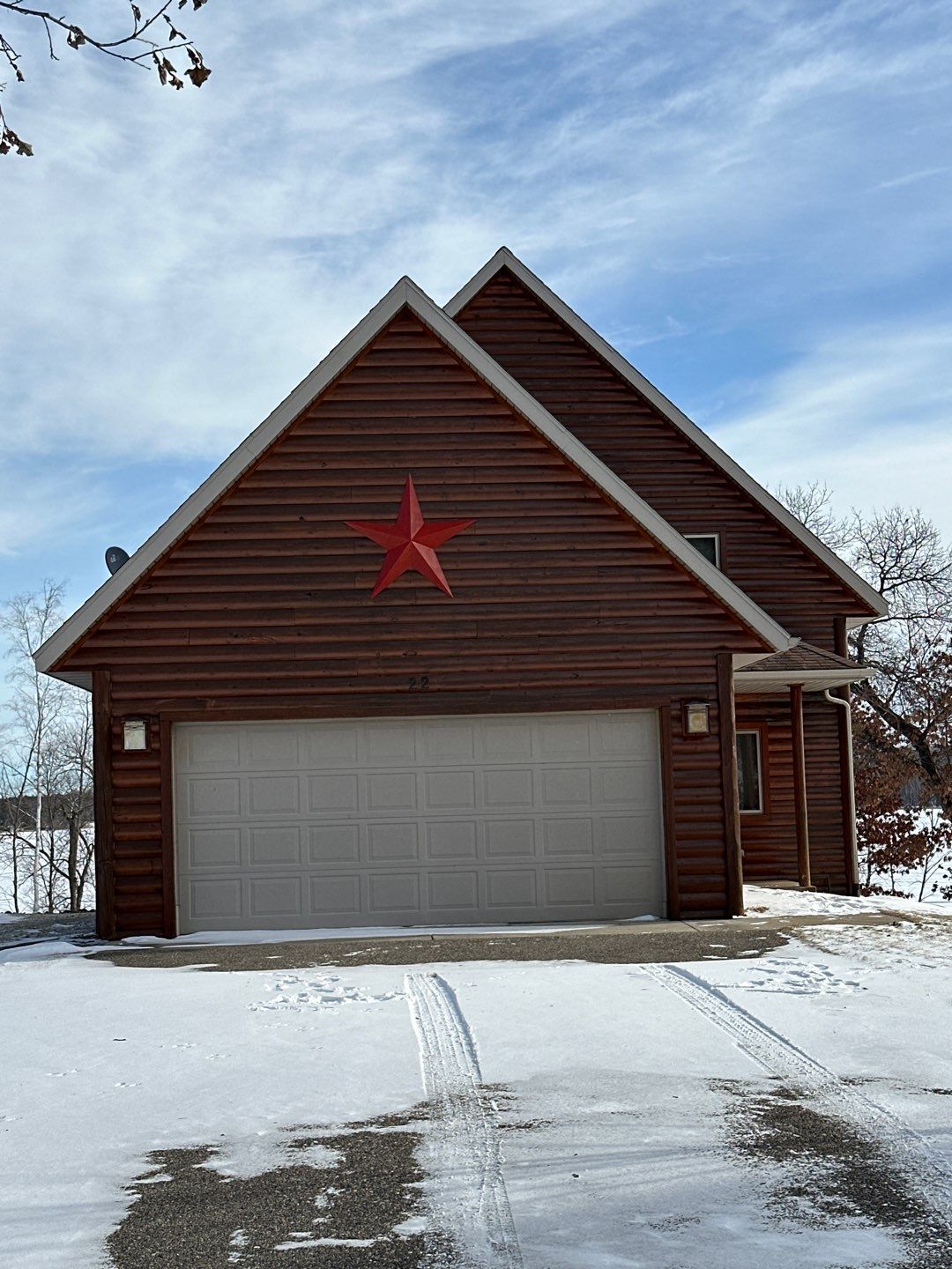 Cabin in Pequot Lakes. Rotted log siding by Koska construction llc