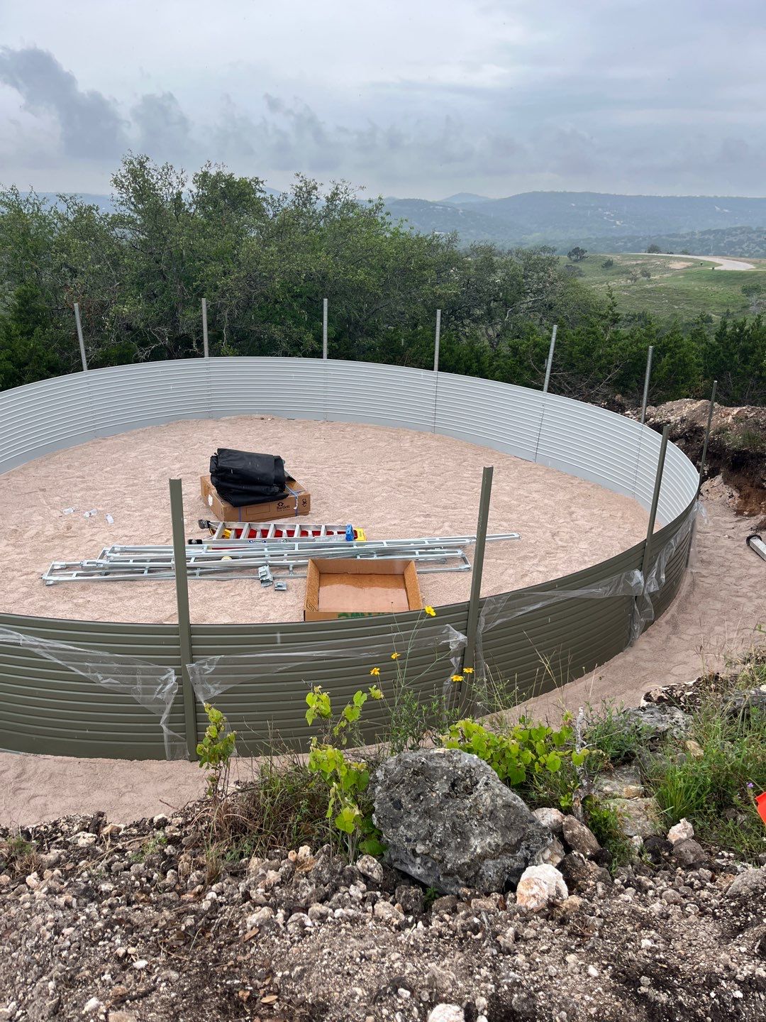 Residential Rainwater Collection System - Pioneer 40K gallon water tank in Mangrove Green by Hill Country Rain Water