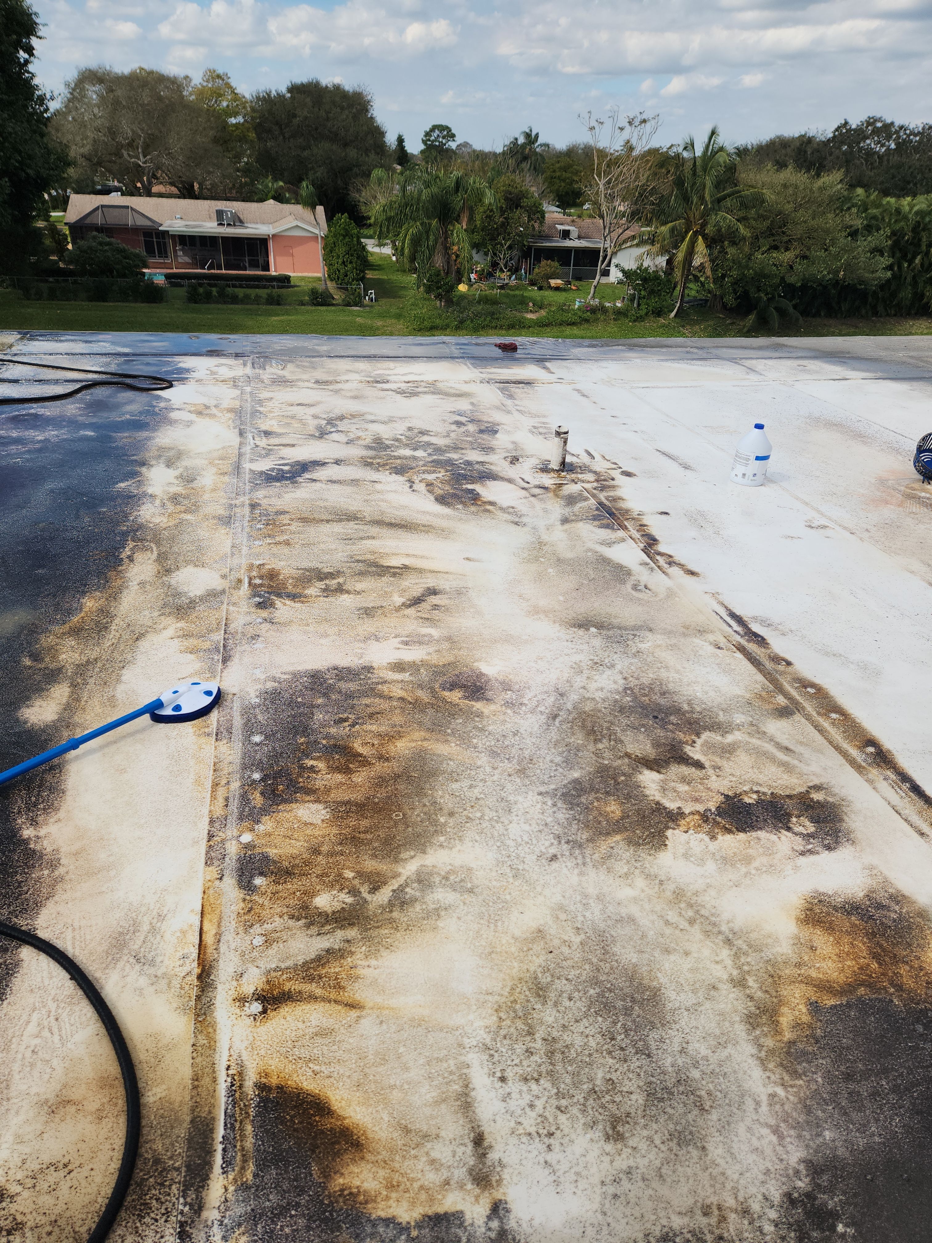 Reflective Silicone Roof Coating and Maintenance in Palm Beach Gardens by Aastro Roofing