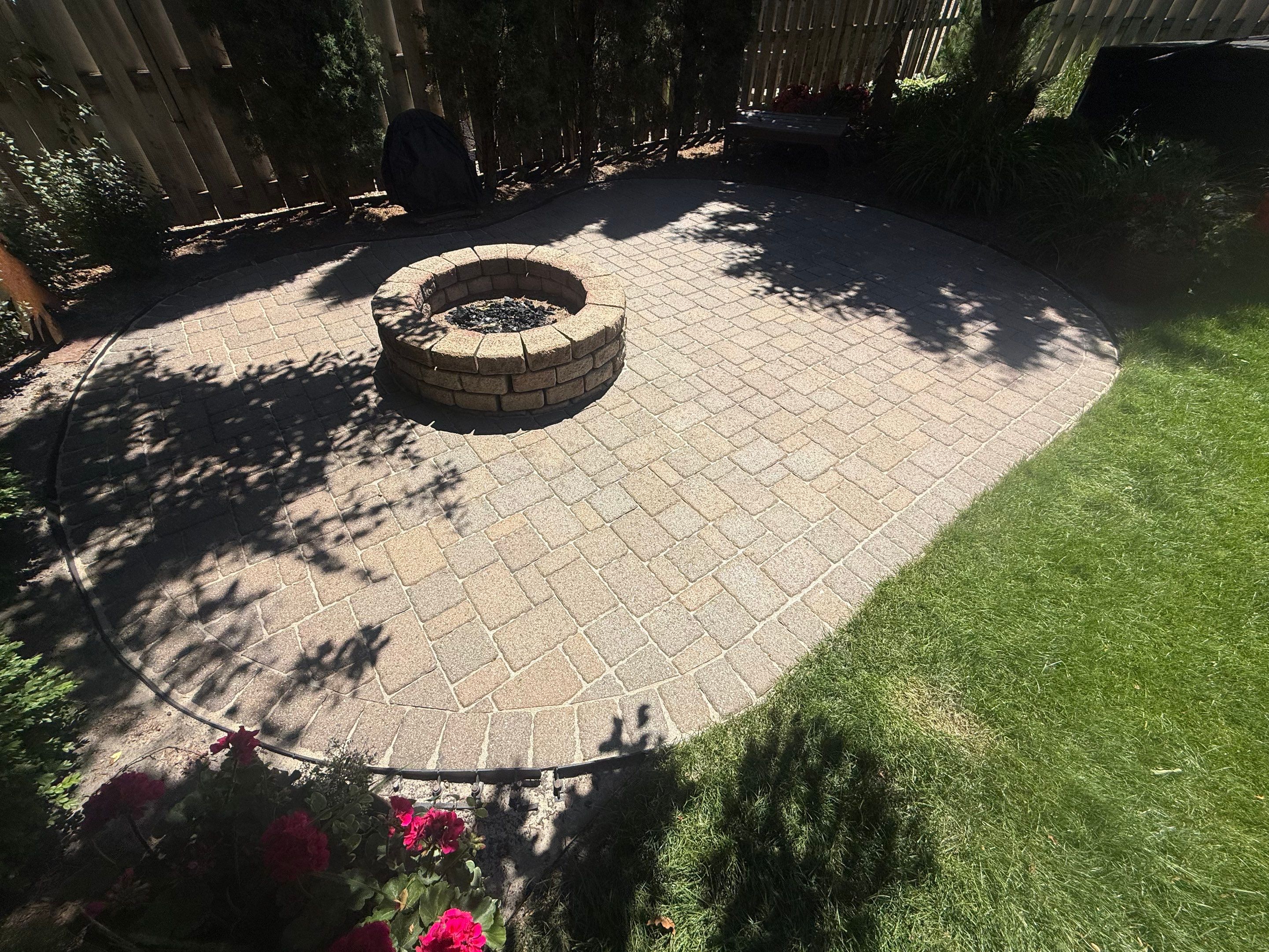 Textured Concrete Coating and Paver Patio Refresh in Sioux Falls by Select Painting, Coatings & Garage Cabinets