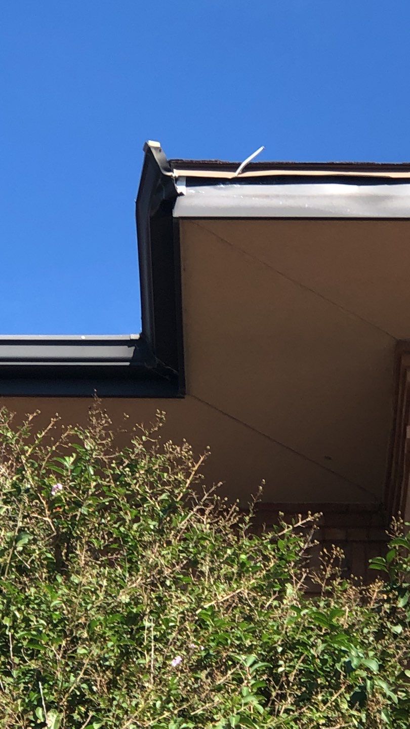 Pensacola Realtor Association Gutter Installation using K-Style White Gutters by Gutter Professors