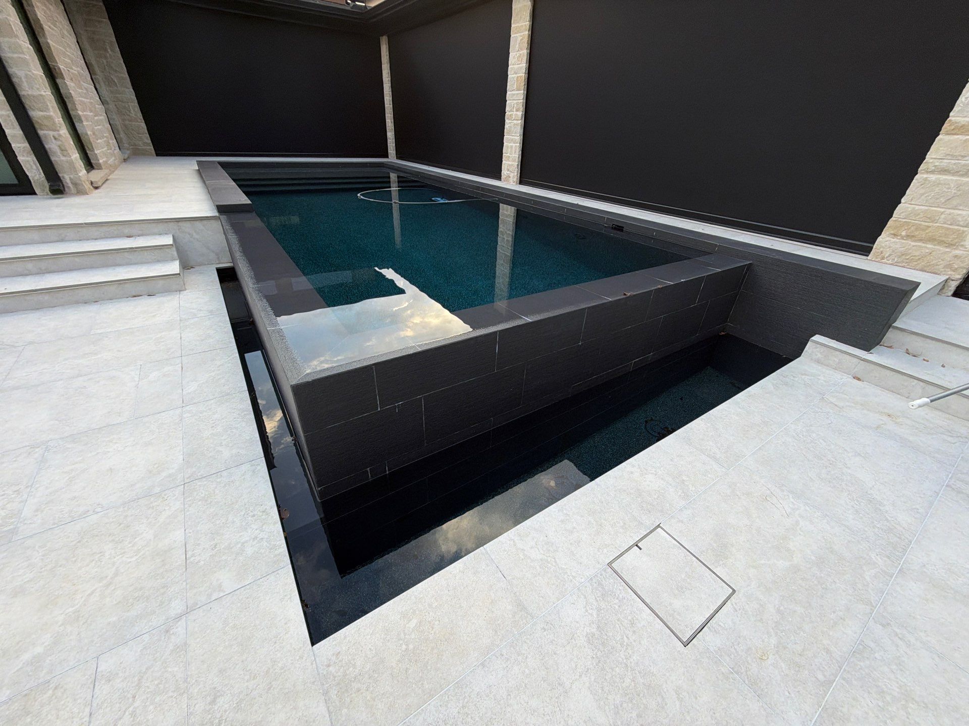 Modern Geometric Pool with Dark Interior Finish by Pinnacle Pools and Spas - DFW
