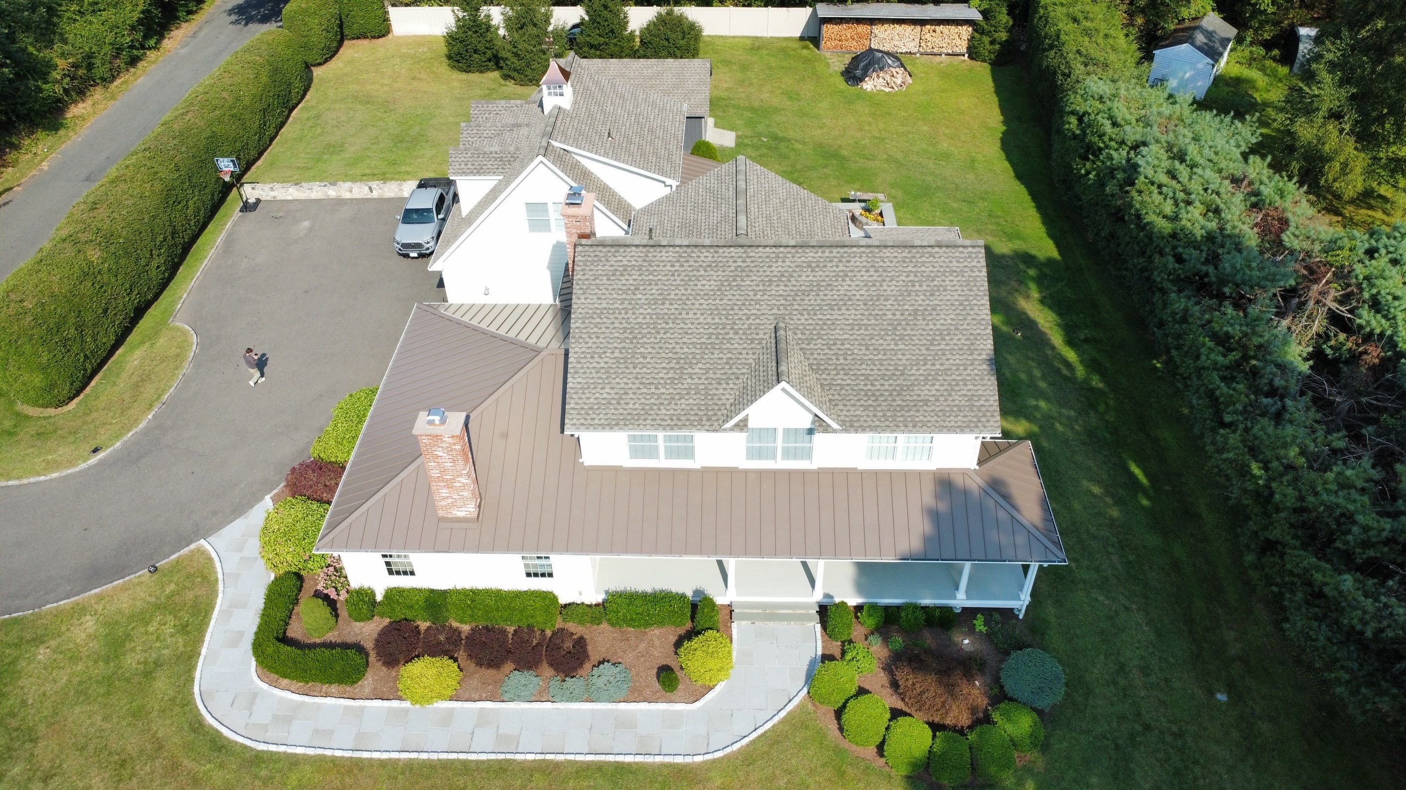 Asphalt & Standing Seam Metal Roof Replacement  by Lecla Home Improvements and Roofing INC