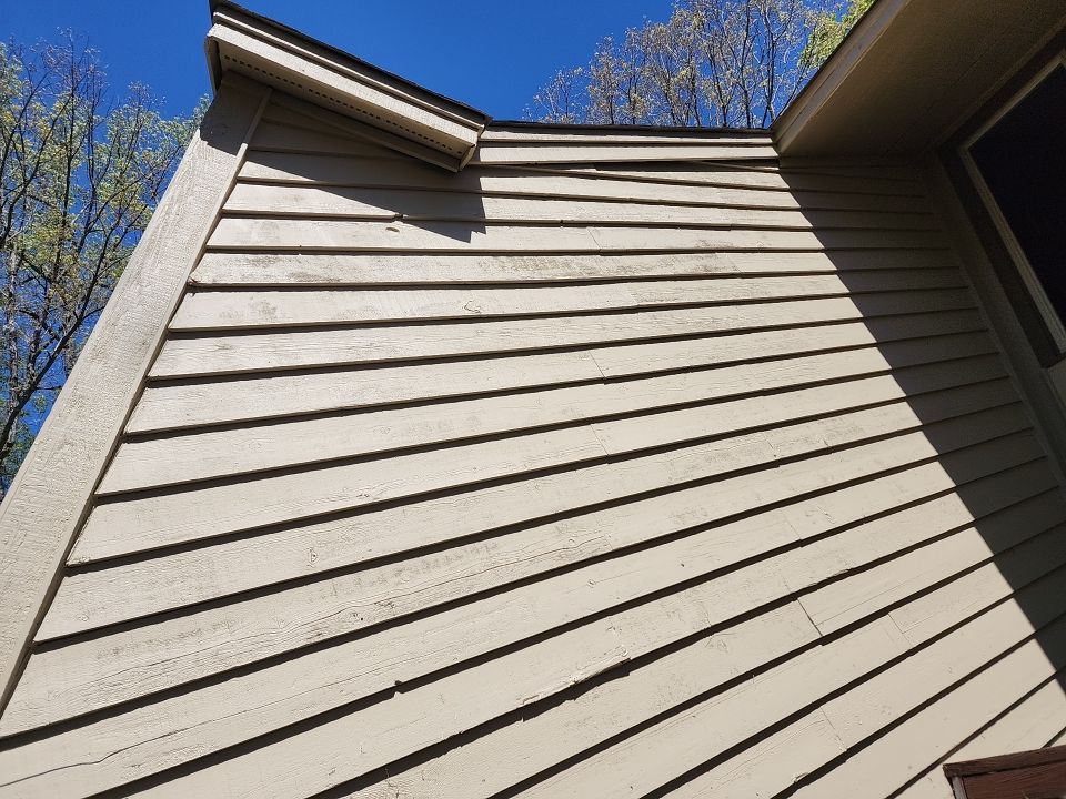 Exterior renovation using James Hardie Siding and Simonton Windows by Indigo State Roofing