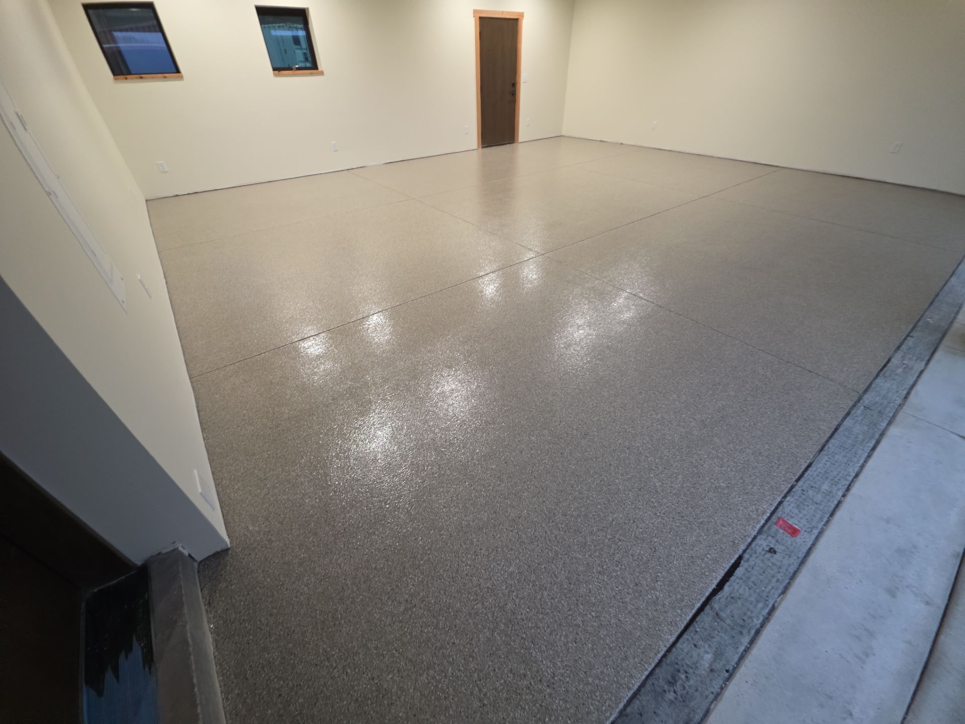 Garage Transformation using Pebble Beach by Croc Coatings, LLC