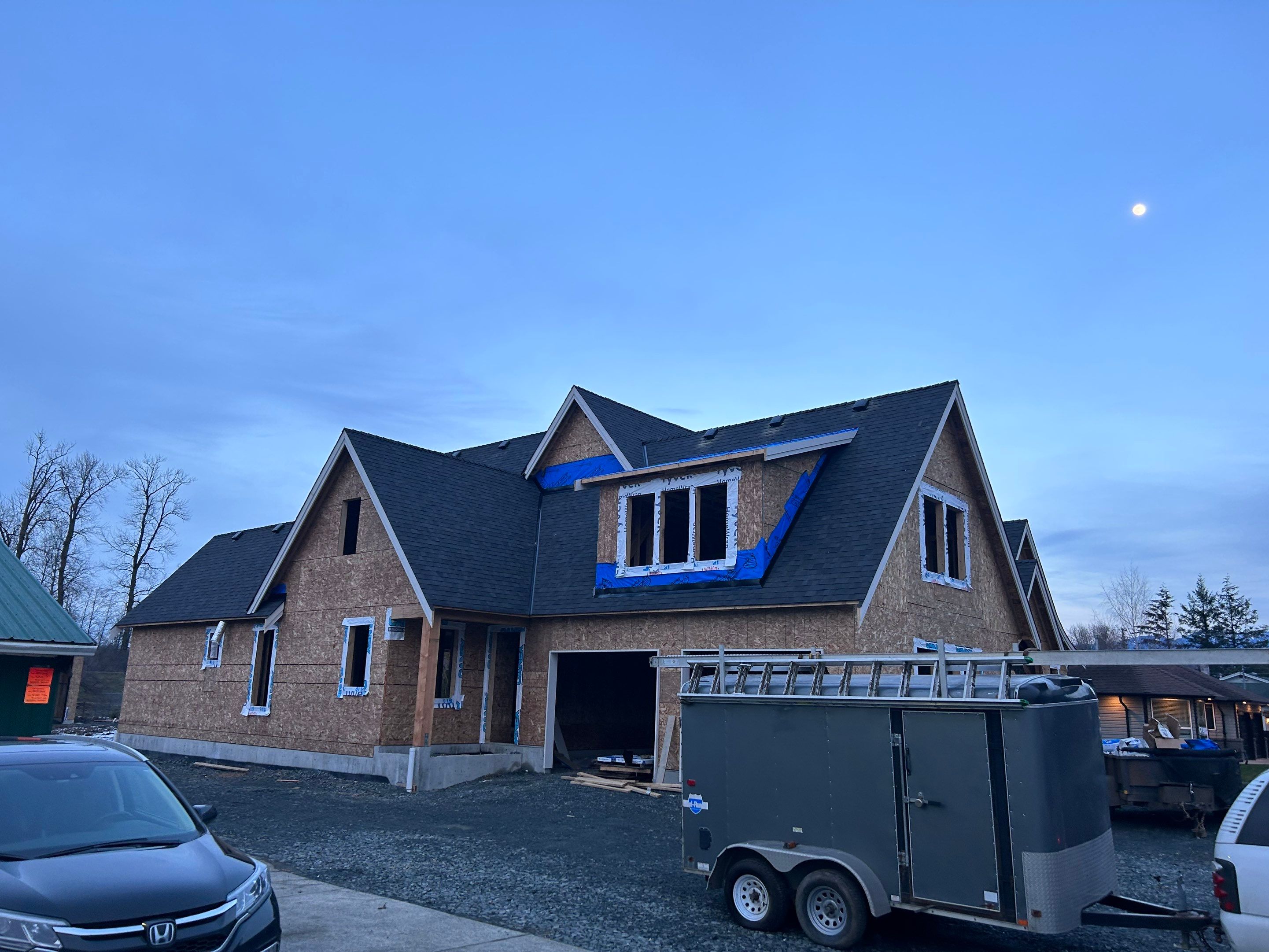 Residential Roofing Installation using Malarky Vista Shingles and Prolok Metal  by Top Notch Roofing Inc