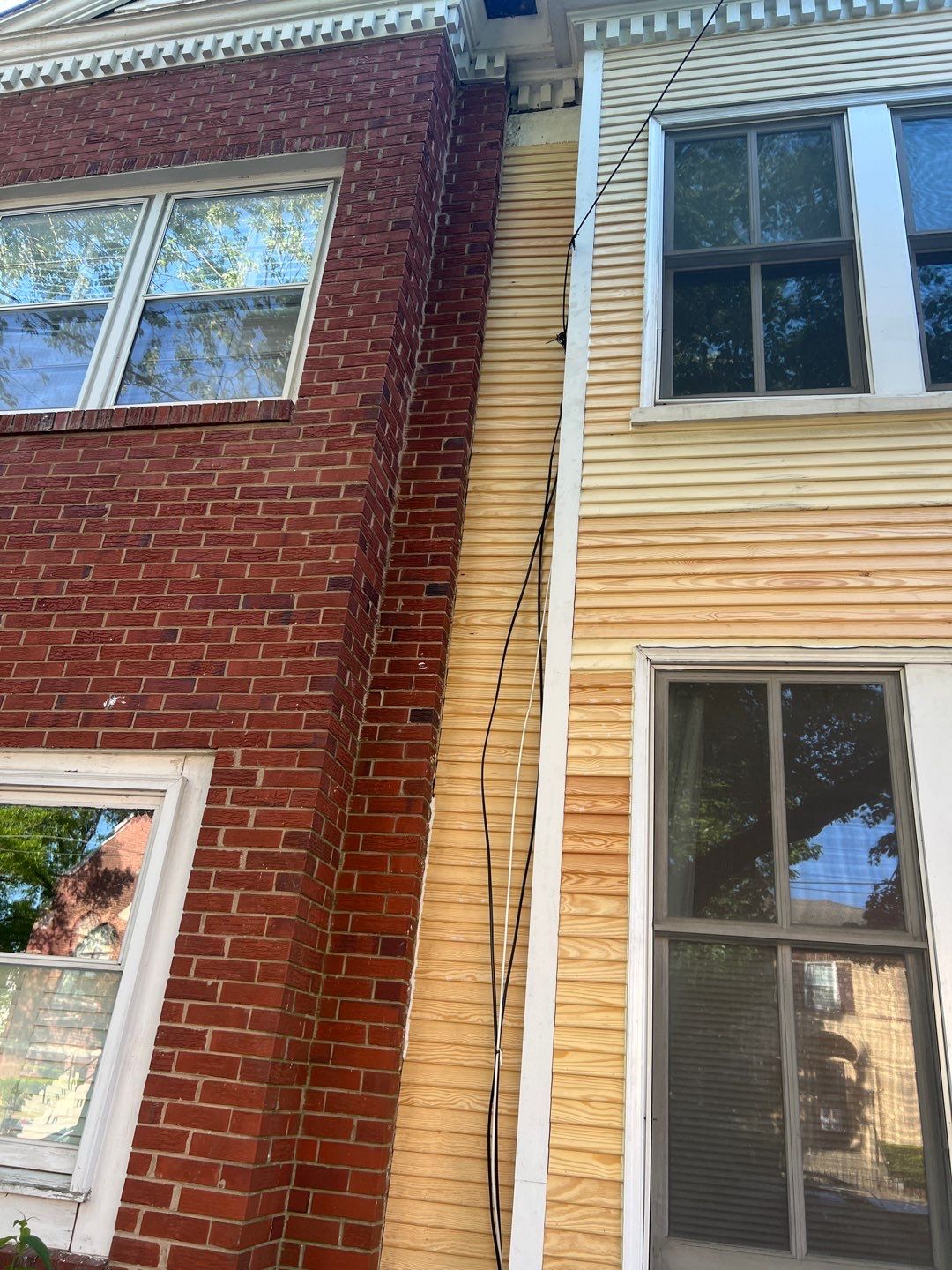 Alexandria: Siding Replacement with Solid Pine Wood Lap Siding by RM Banning, Inc.