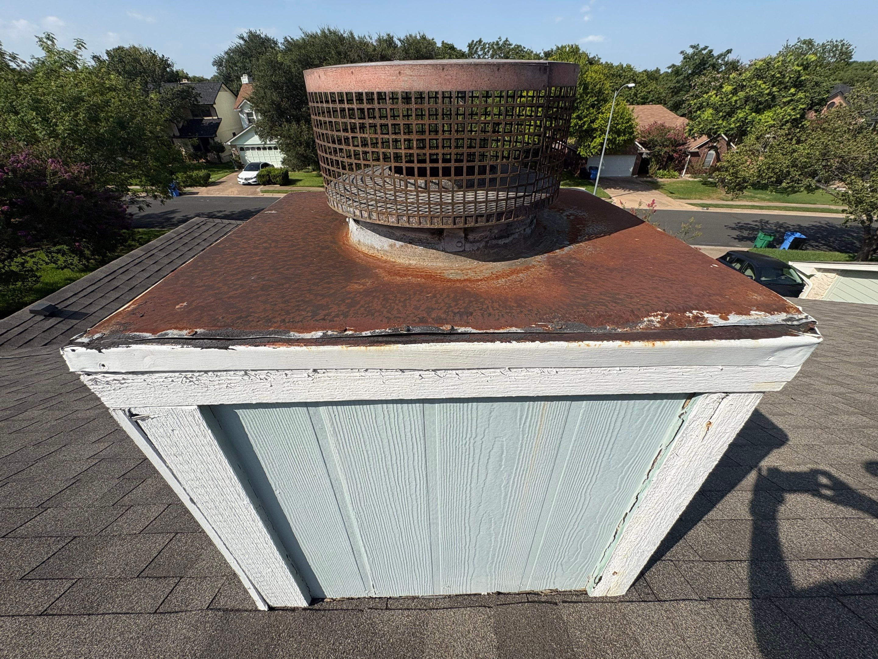 Chimney Siding Repair and New Cap Installation in Austin by DeZign Roofing & Exteriors