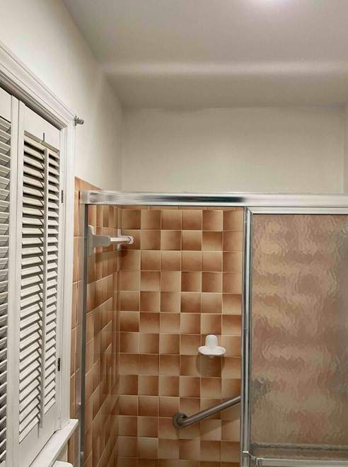 New shower, flooring, and countertop by The Shower Company