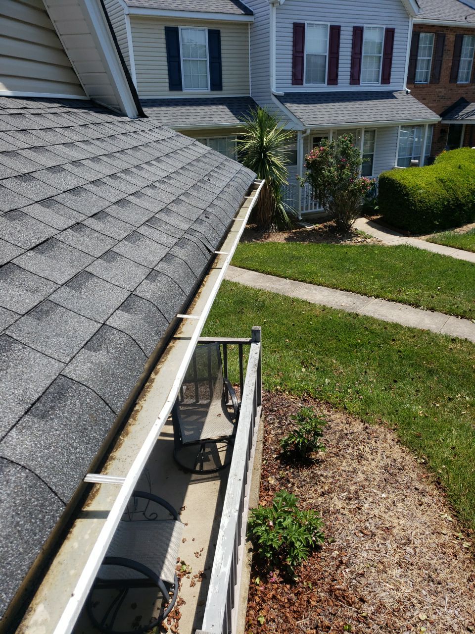 Gutter Cleaning using water by Power Wash Masters LLC