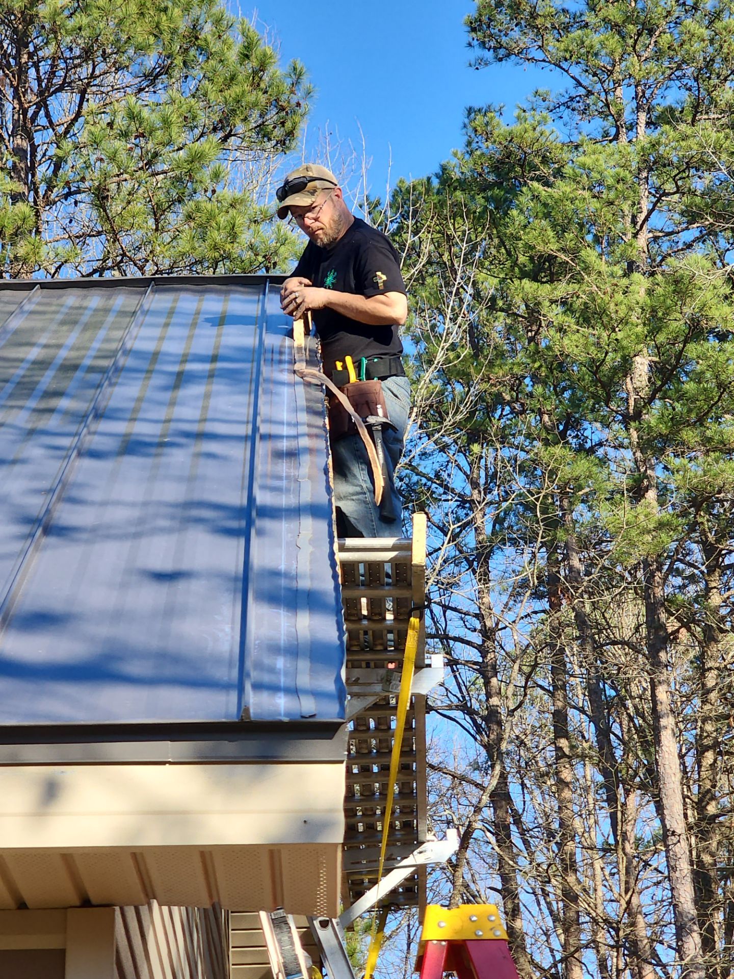 Residential Metal Roof Replacement using Reed's Metals: 26 GA. Standing Seam: Charcoal Grey by Hostetler Roofing