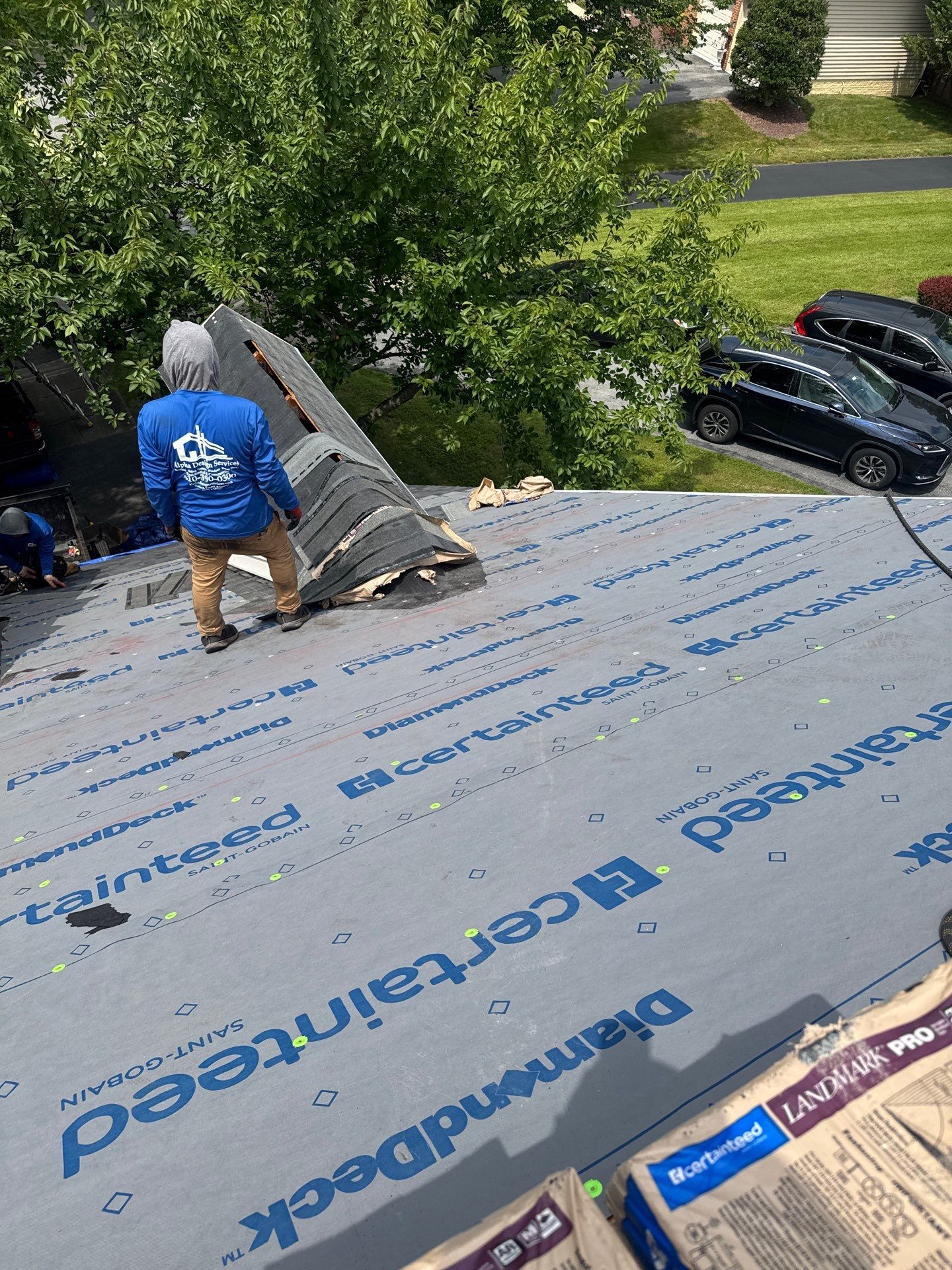 New Shingle Roof & New Gutters and downspouts with covers by Alpha Design Services