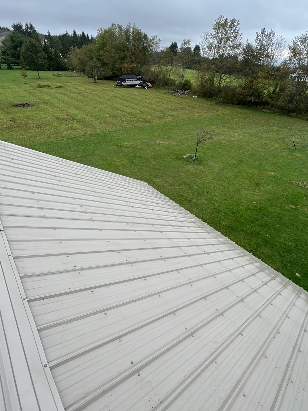 Light Stone Exposed Fastener by Reimagine Roofing