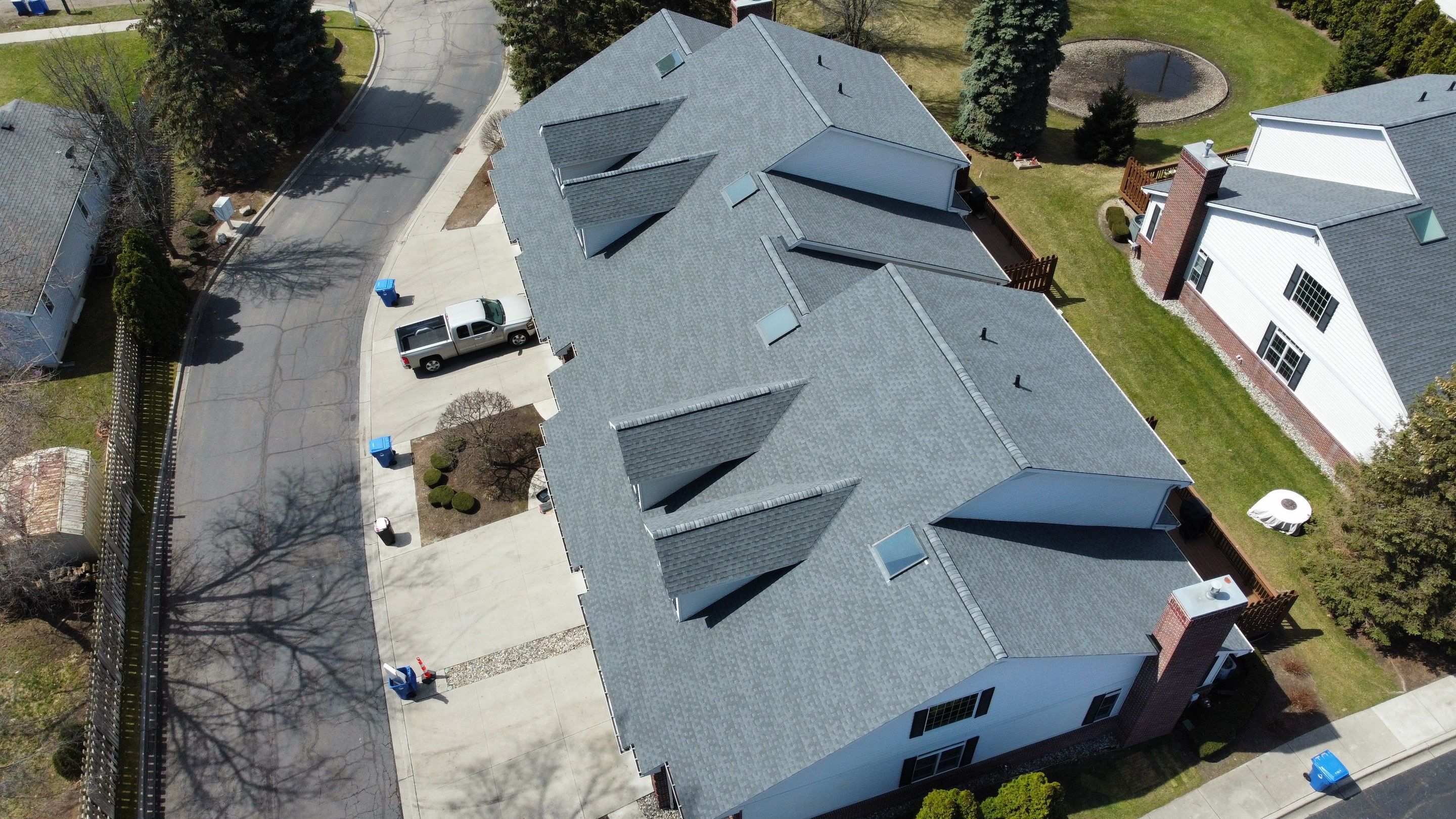 Condo Association Roof Replacement using GAF Shingles by Bloomfield Construction & Restoration