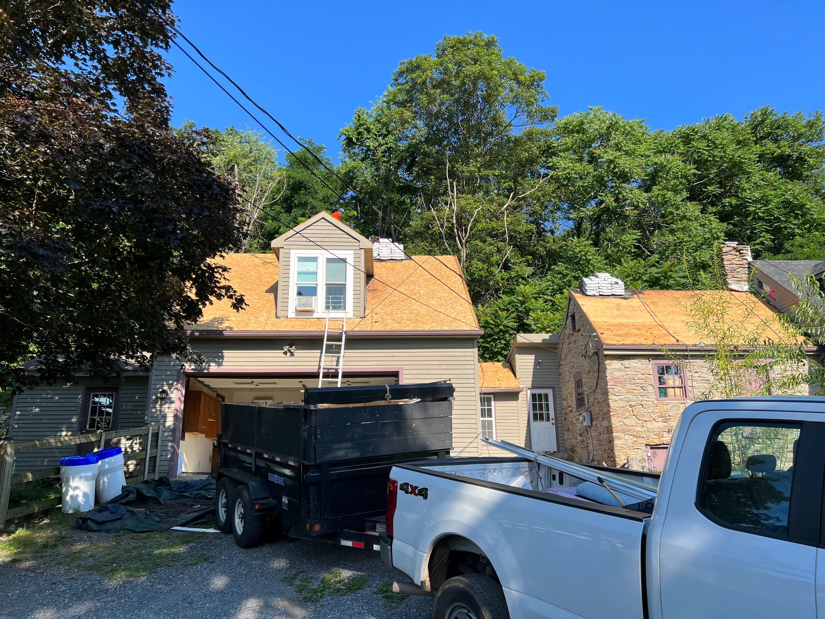 Residential Roofing Installation using Atlas Pinnacle Pristine Black Architectural Shingles by Frederick Roof Repair