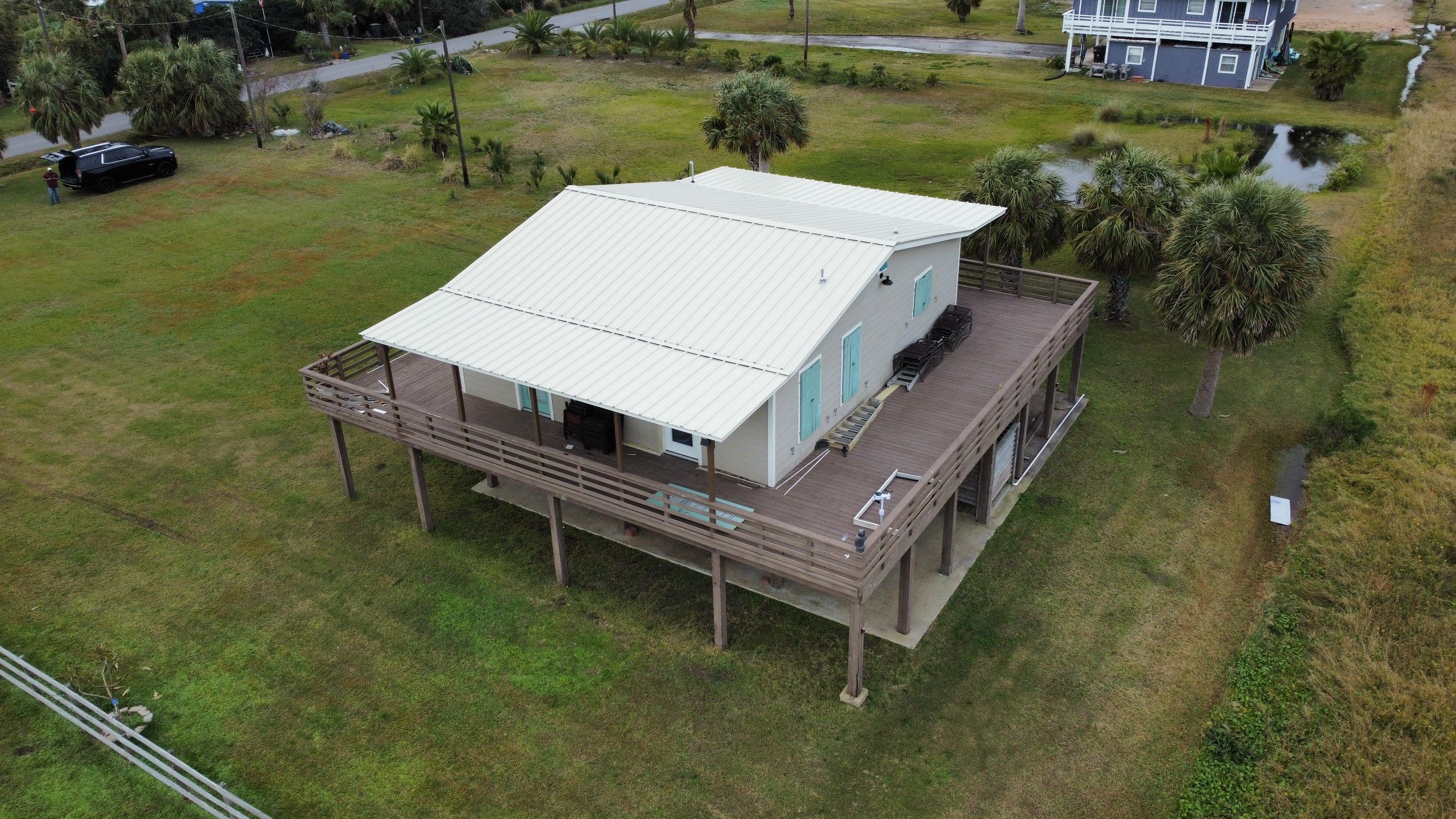 Residential Roofing Installation using R-Panel Metal Roofing on Galveston Island by Core Four Roofing