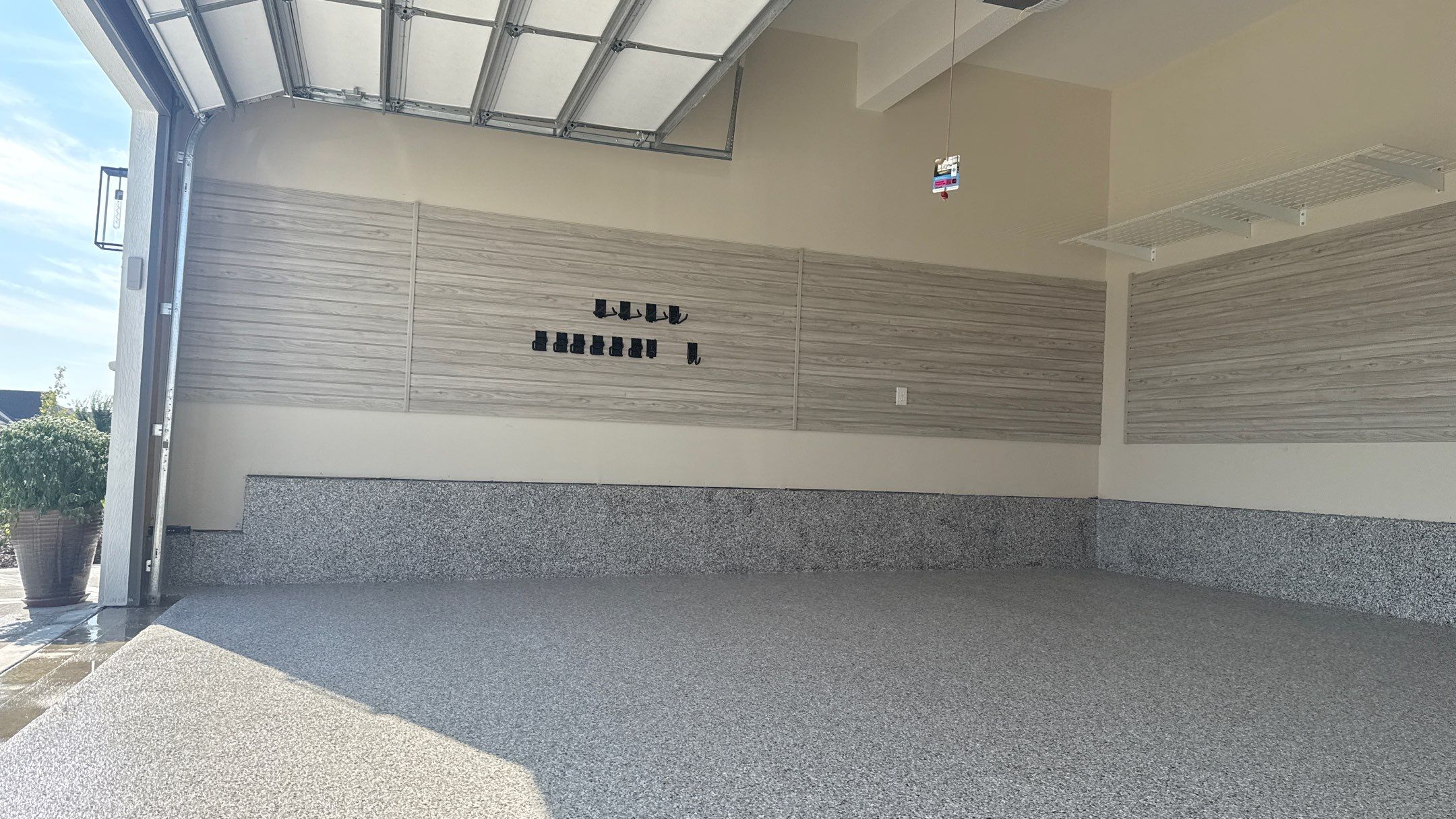Wendy's Floor And Storage Makes All The Difference by Banner Garage