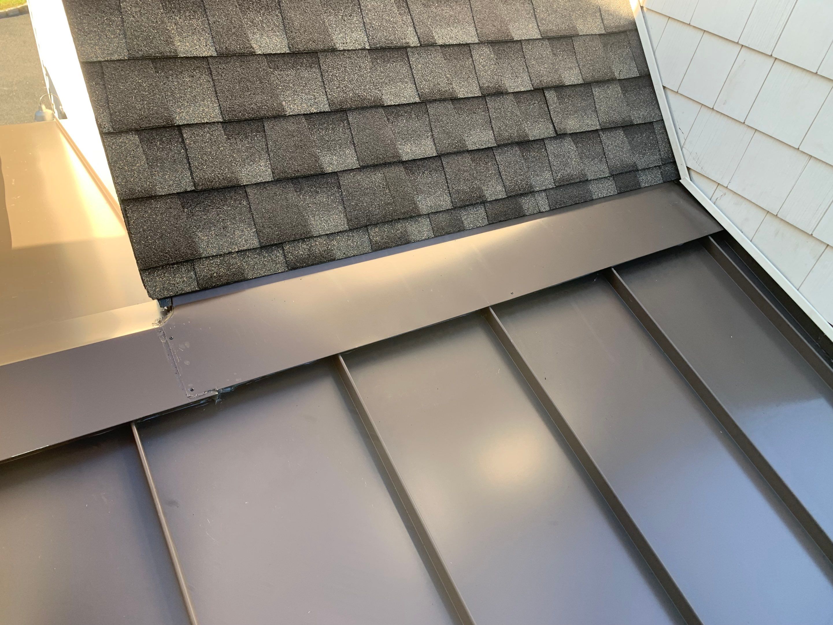 Asphalt & Standing Seam Metal Roof Replacement  by Lecla Home Improvements and Roofing INC