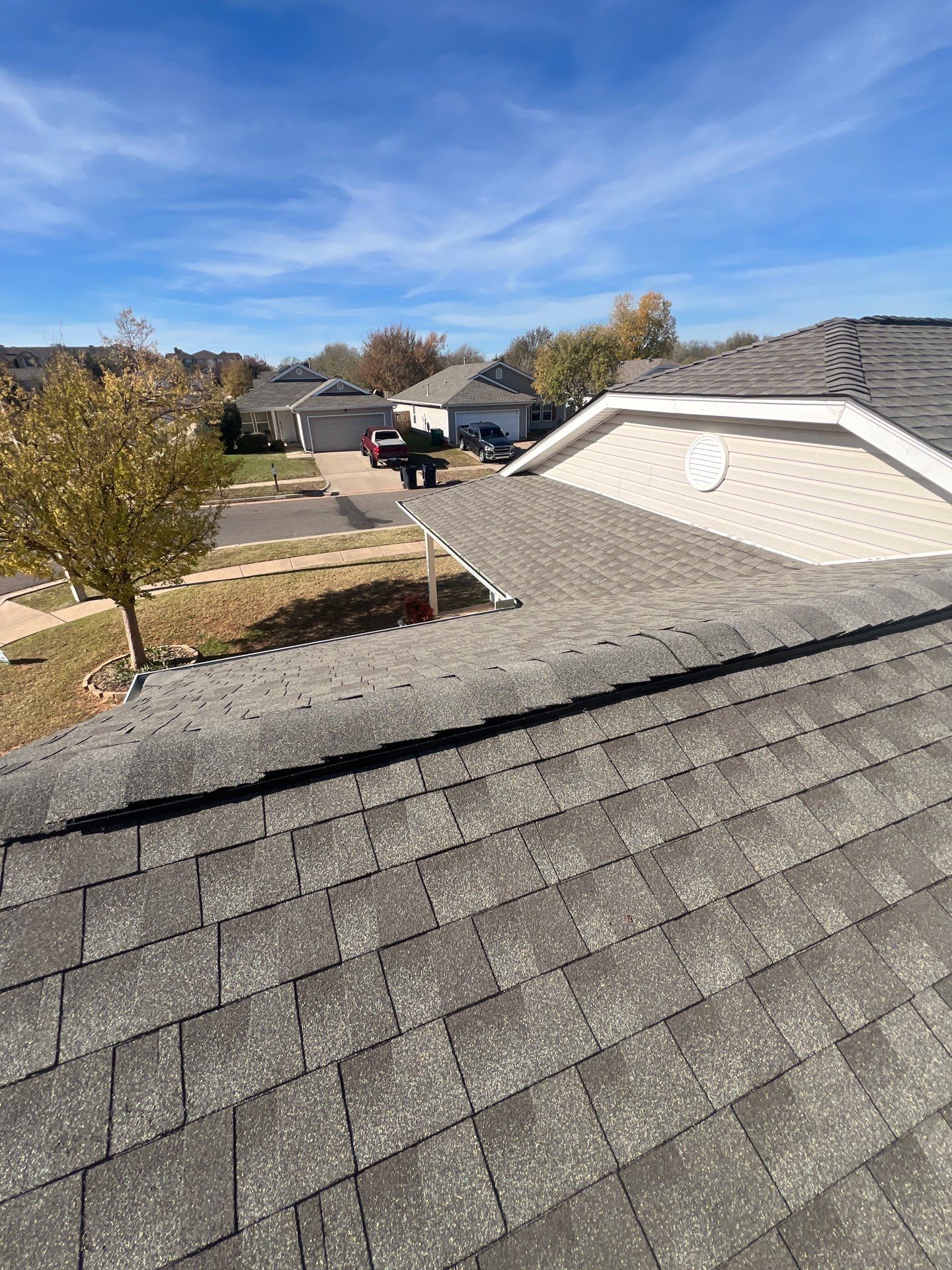 roof replacement & gutter installation in Edmond by McCann's Roofing and Construction