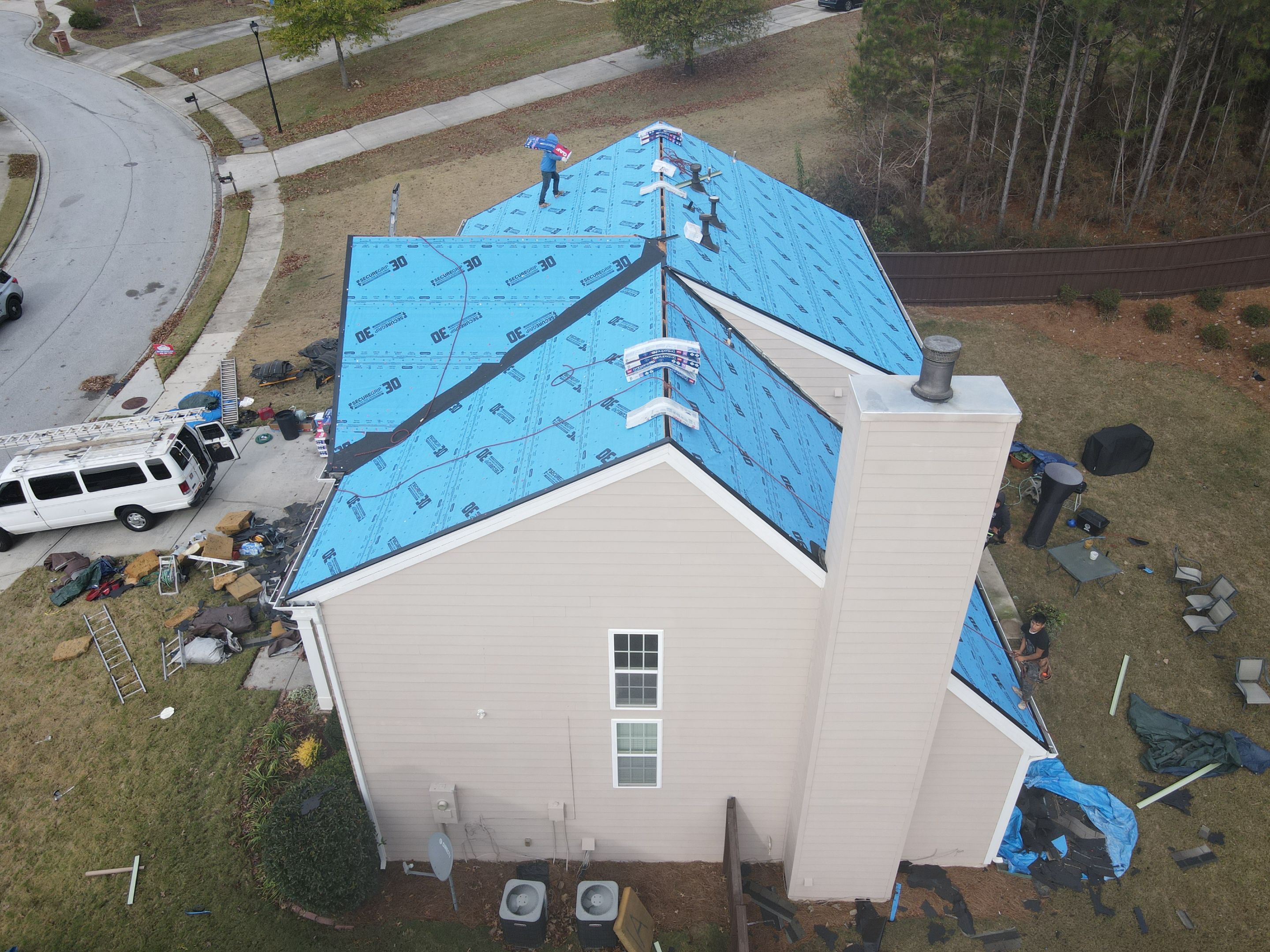 Residential Roofing Installation using Timberline HDZ Hickory  by Inspector Roofing and Restoration