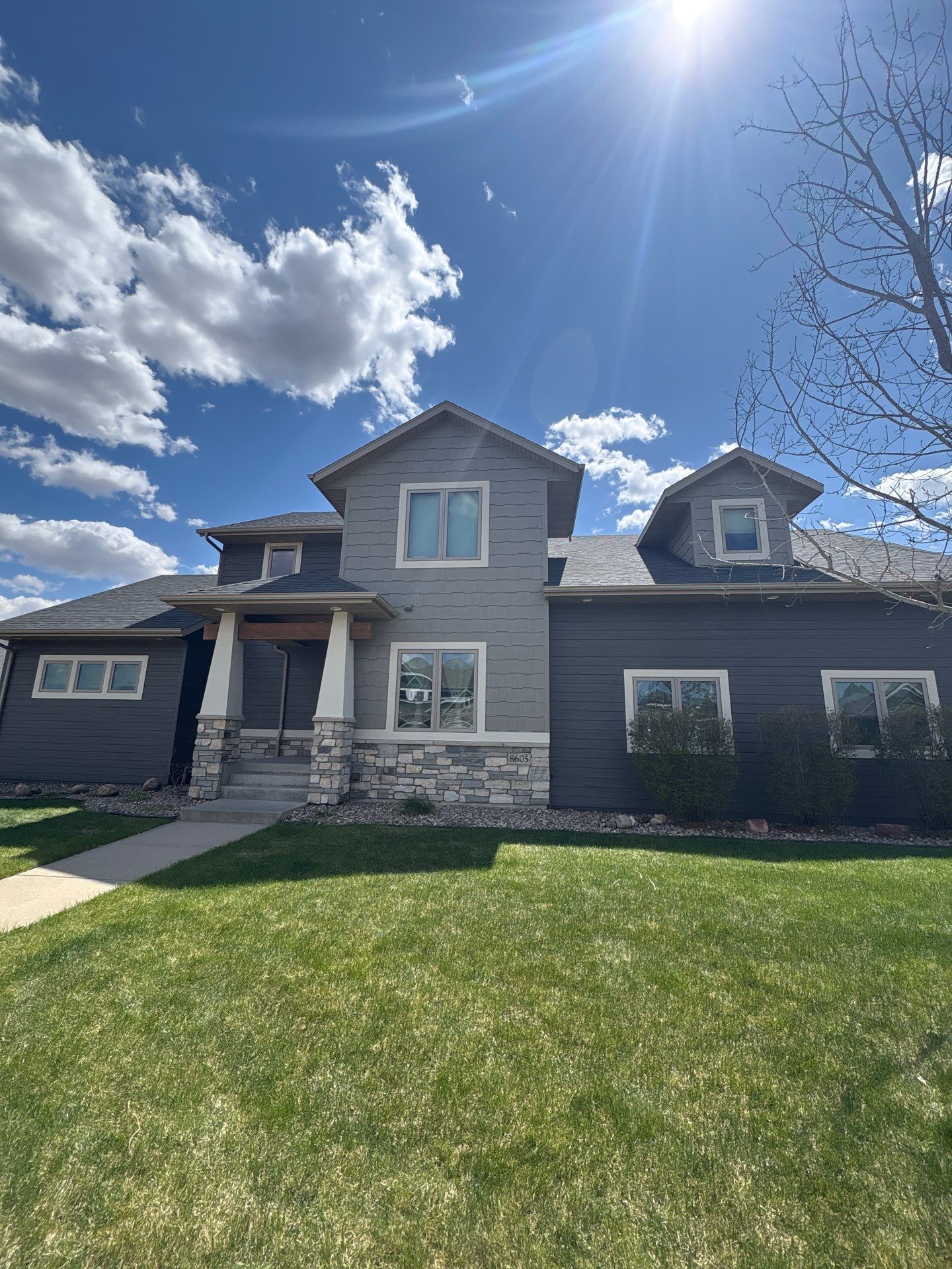 Residential Exterior Painting and Color Update in Sioux Falls by Select Painting, Coatings & Garage Cabinets