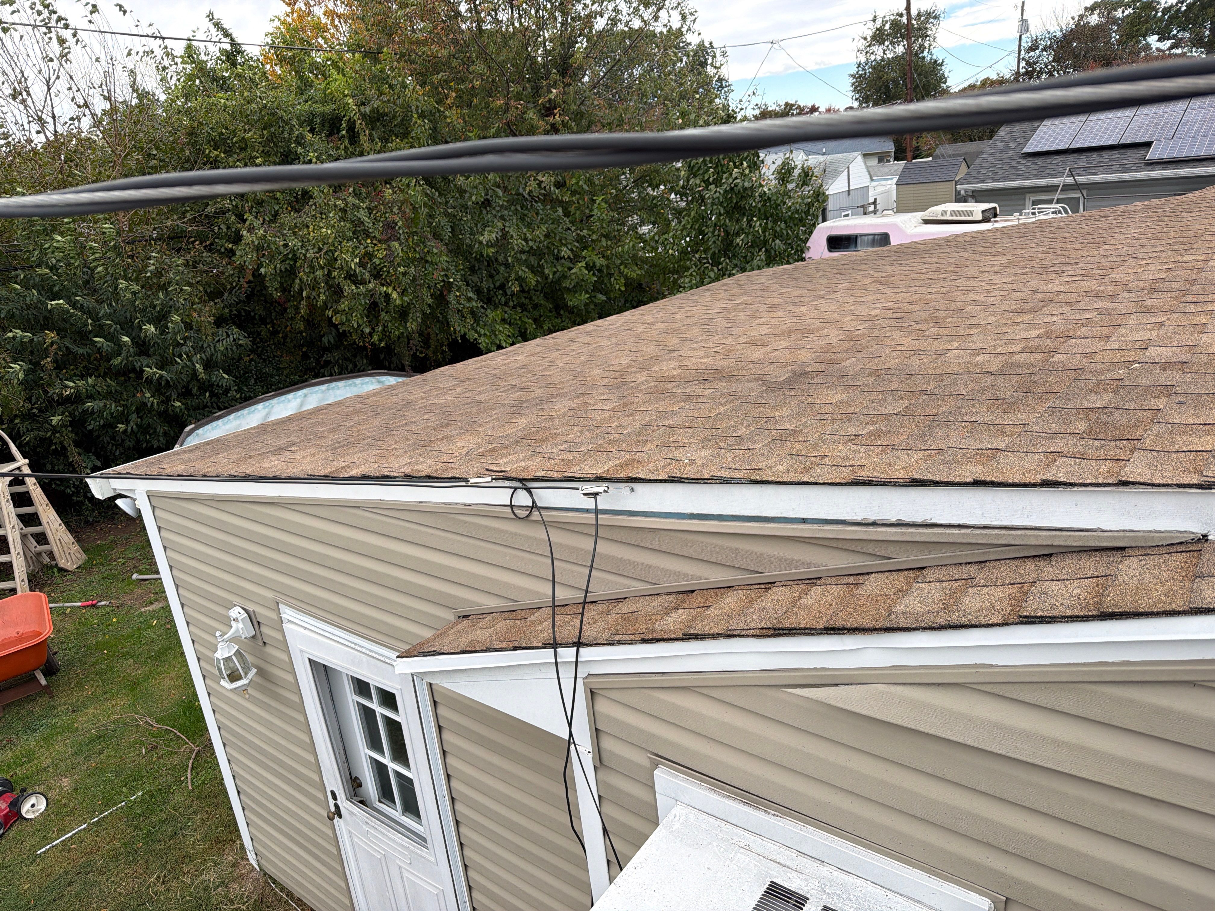 Flat Roof Replacement and Shingle Integration in Levittown by Stofan Construction LLC