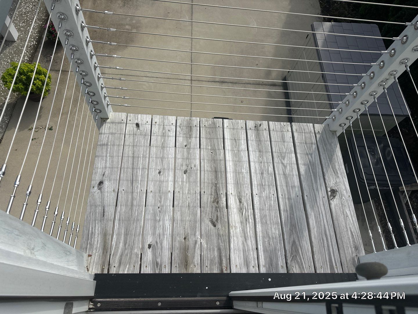 Wood Deck and Concrete Driveway using Wood and Concrete Sealant by DuraSeal