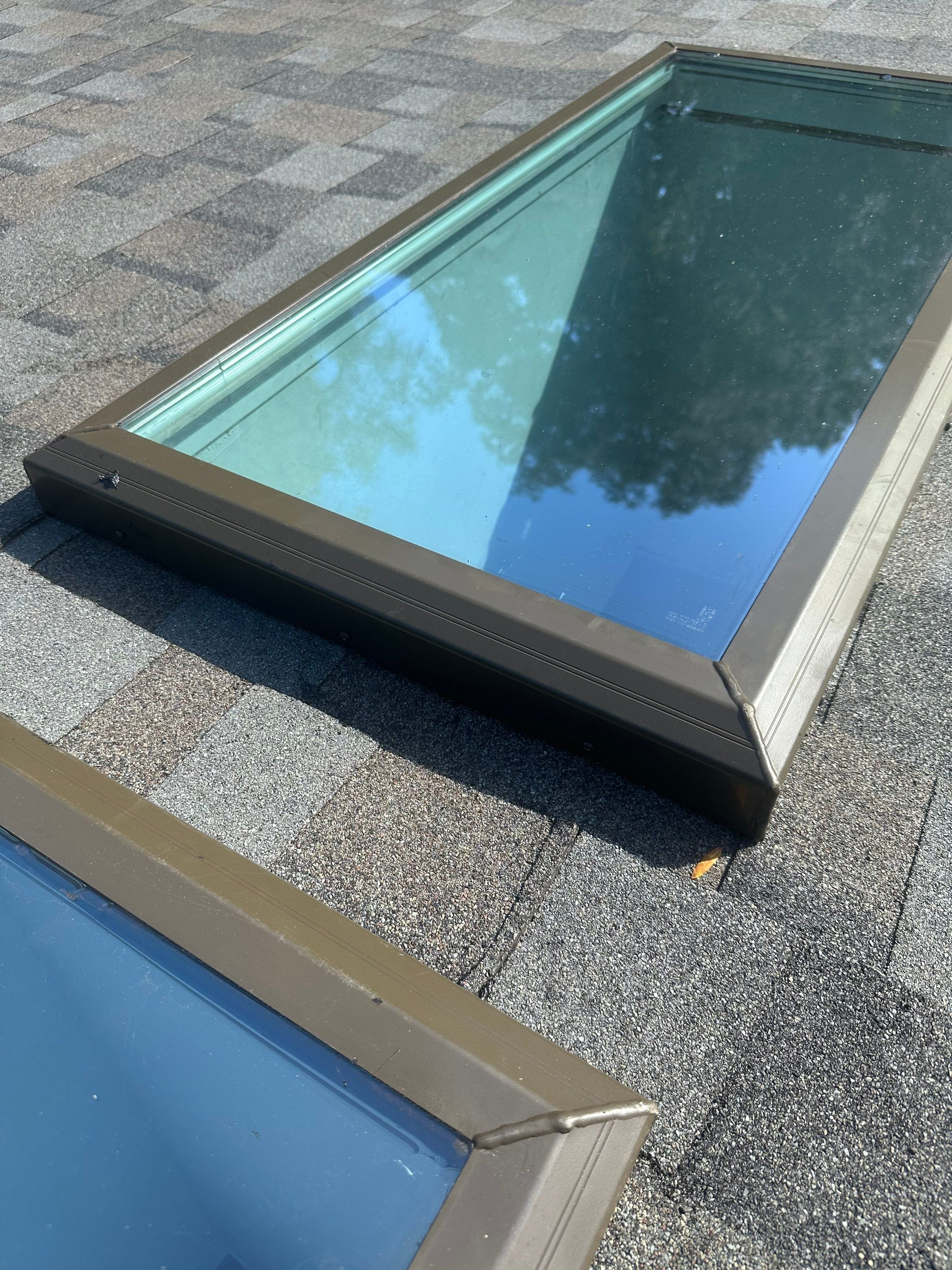 Reroof with Skylight in Gainesville, FL by Brehm Roofing