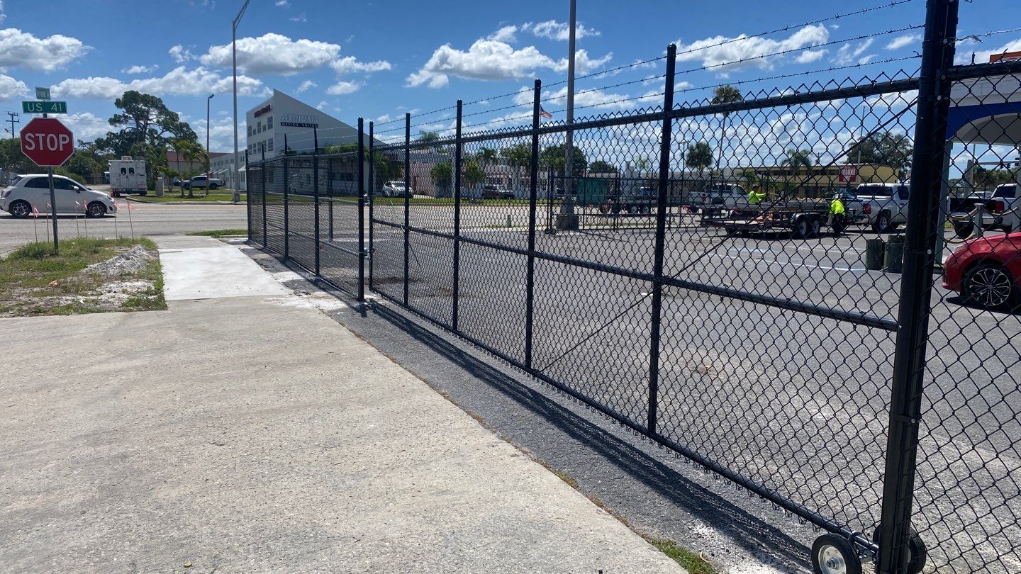 Parrish, FL 6+1 Black Commercial Chain-Link Fence by Asap fence and gates, LLC