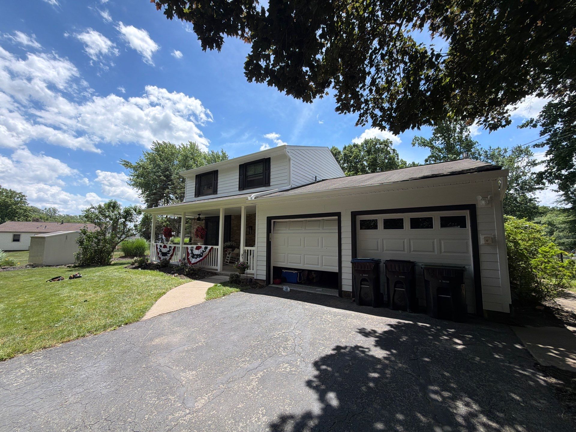 Vinyl Siding to James Hardie Arctic White with Midnight Black Trim by Ideal Siding Pittsburgh