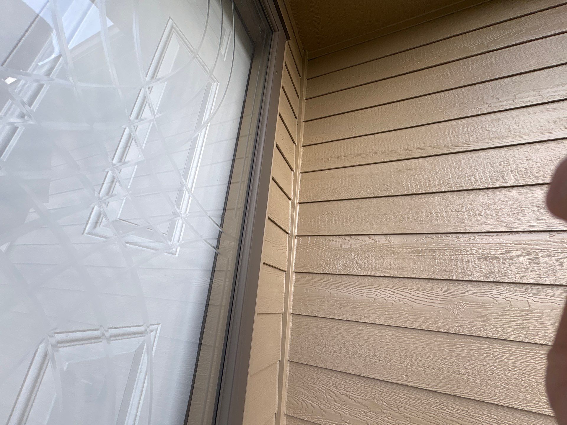 Exterior Painting and Custom Deck Construction in Sioux Falls by Select Painting, Coatings & Garage Cabinets