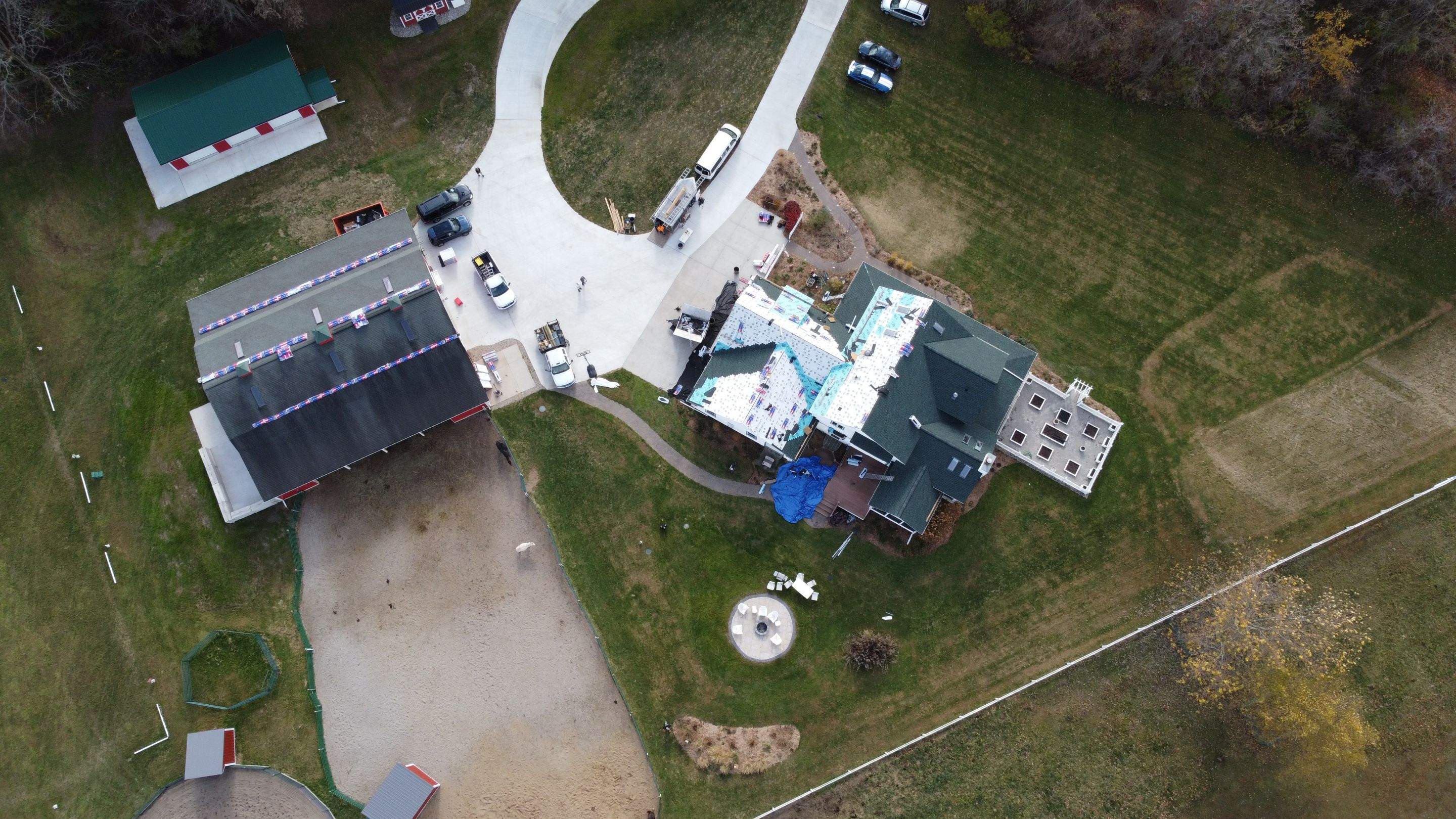 Residential Roofing Replacement with Multiple Skylights in Mason, Michigan by Acme Exteriors