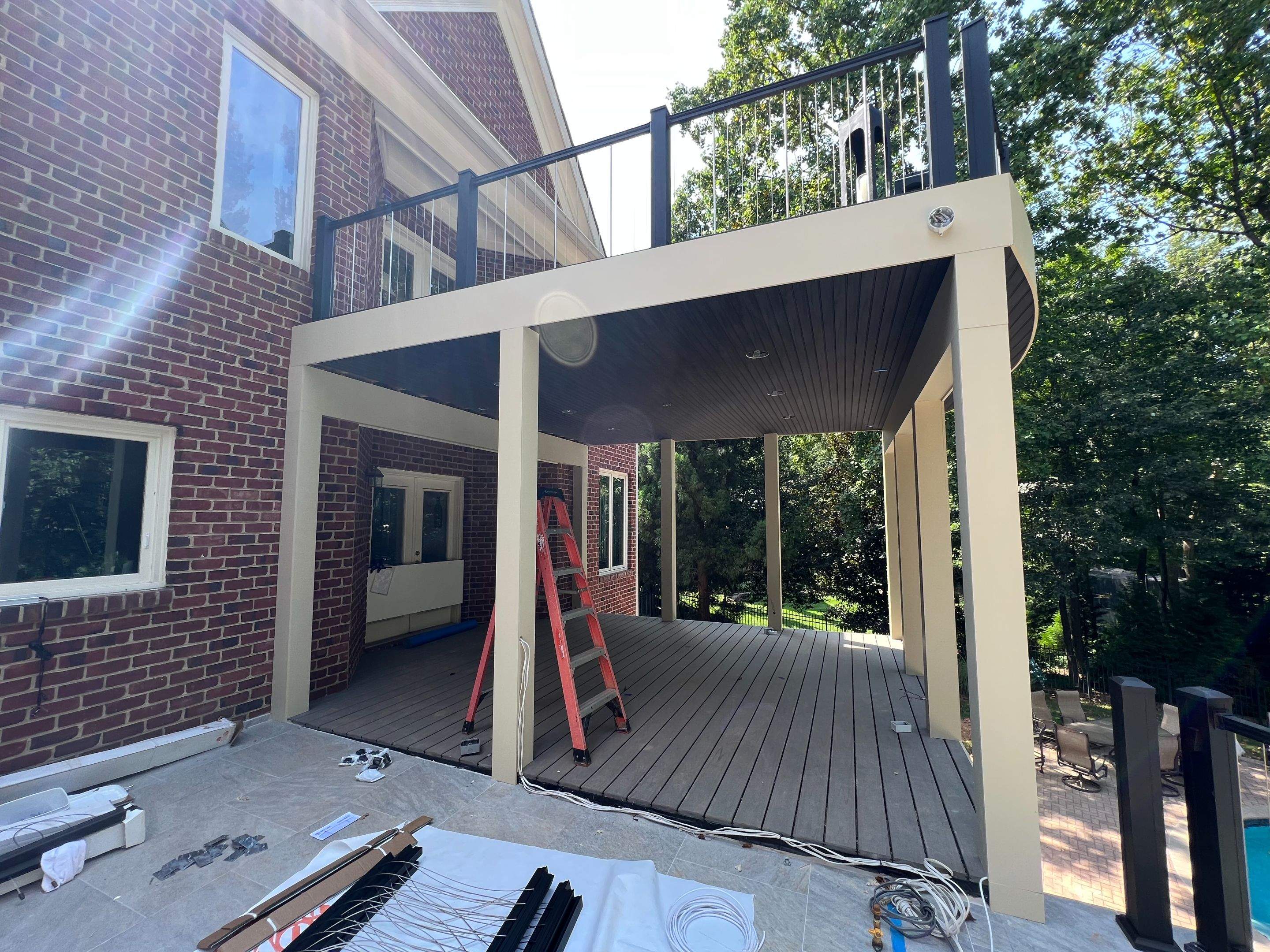 Custom Multi-Level Deck, Outdoor Kitchen & Pool Patio in McLean, VA by Sunburst Construction Inc