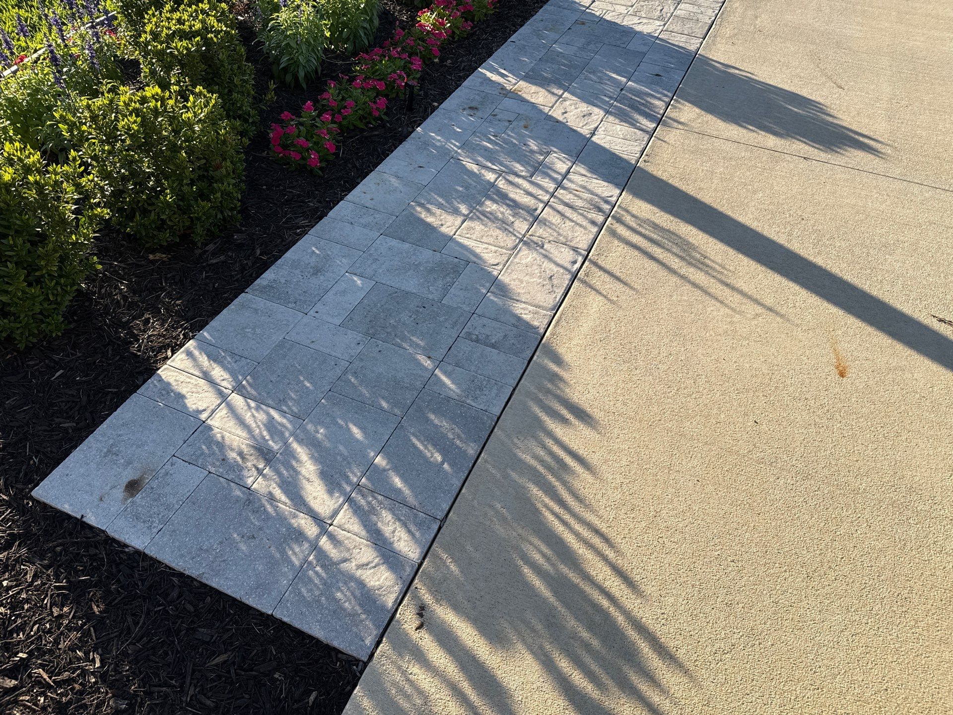 Rust Stain Removal from Concrete Driveway and Pavers in Park East at Azario | Lakewood Ranch, FL by Sunshine AquaWash