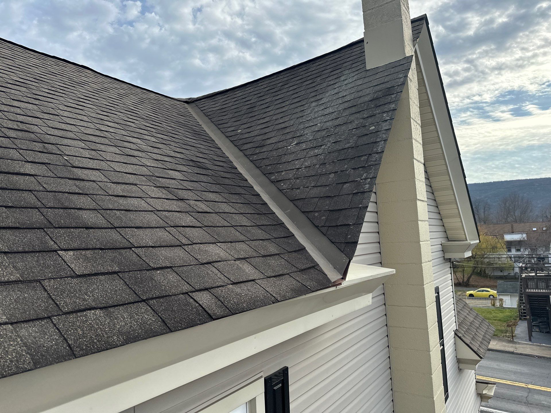 Textured Black Meal Roof by Esh Builders