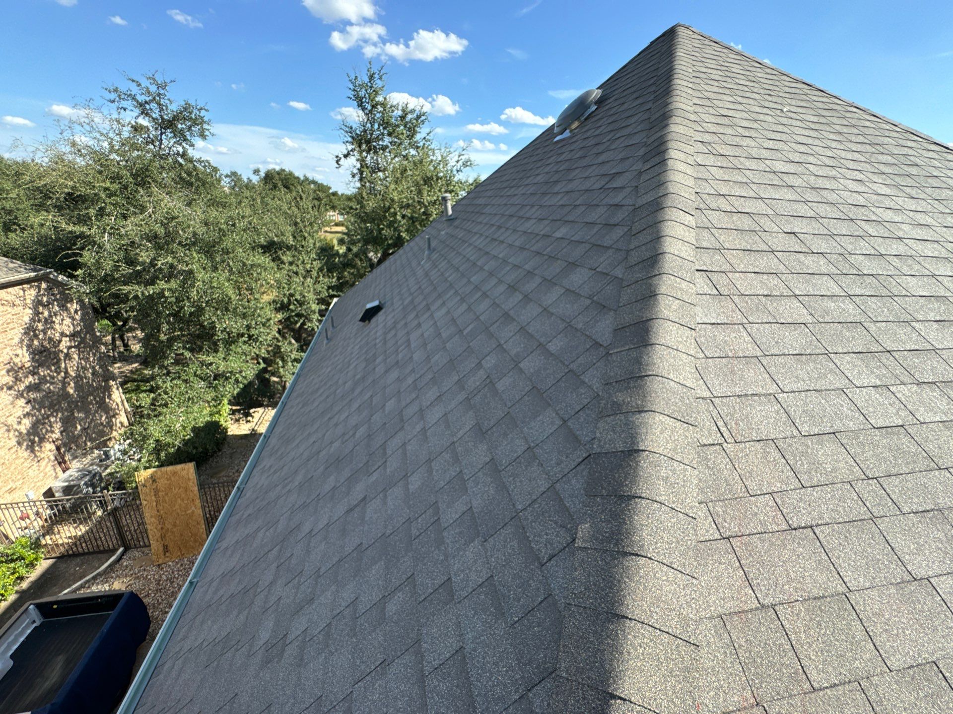 Residential Roofing Installation using IKO, Cambridge in Weathered Wood by Oakwood Roofing and Construction, LLC