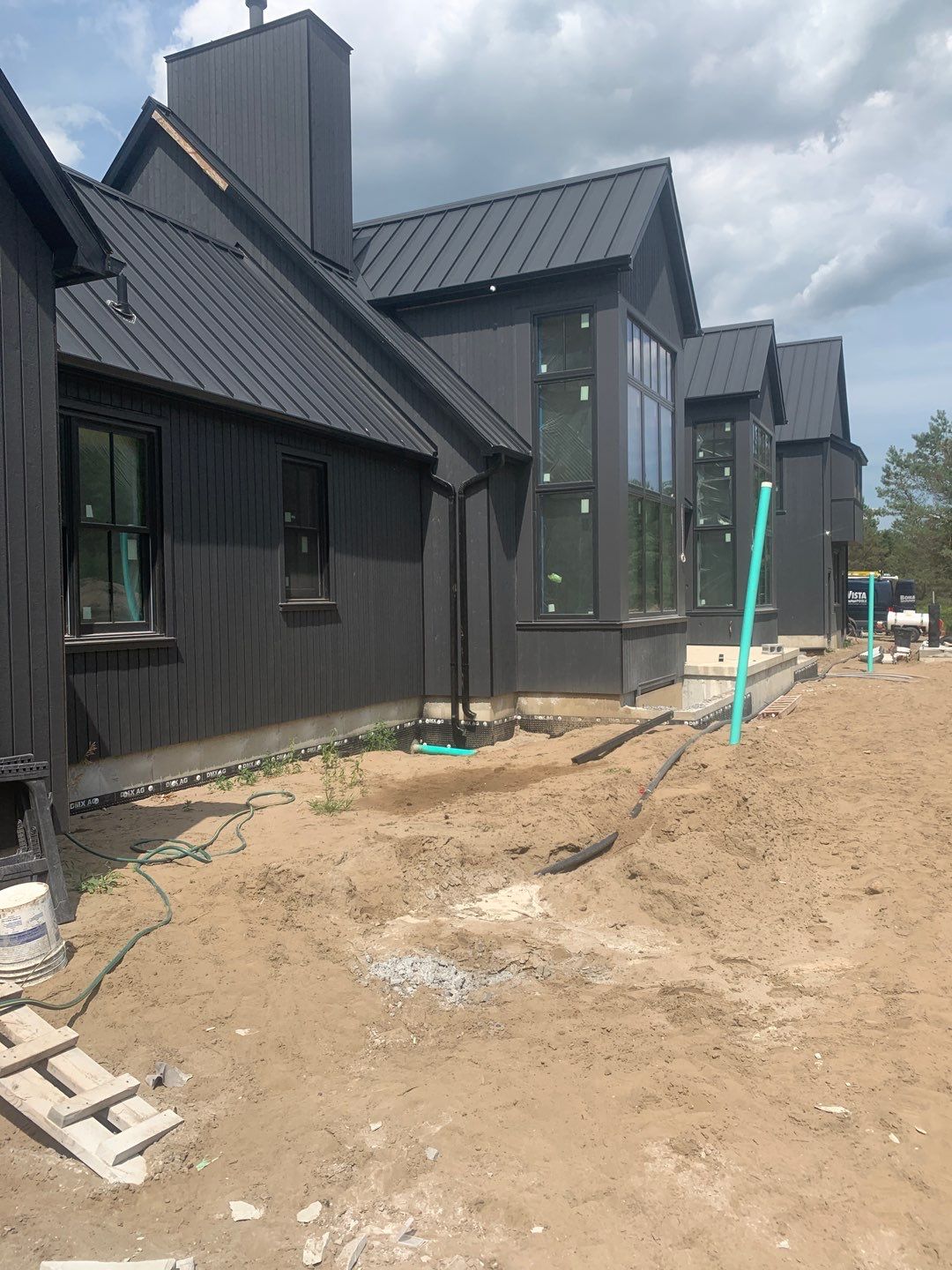 New Home Construction using 16" Standing Seam Panels by Jay Carter Roofing & Sheet Metal