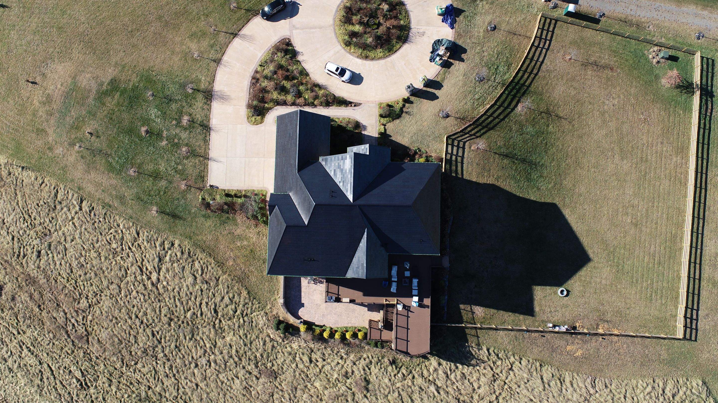 Tesla Solar Roof Replacement by American Home Contractors
