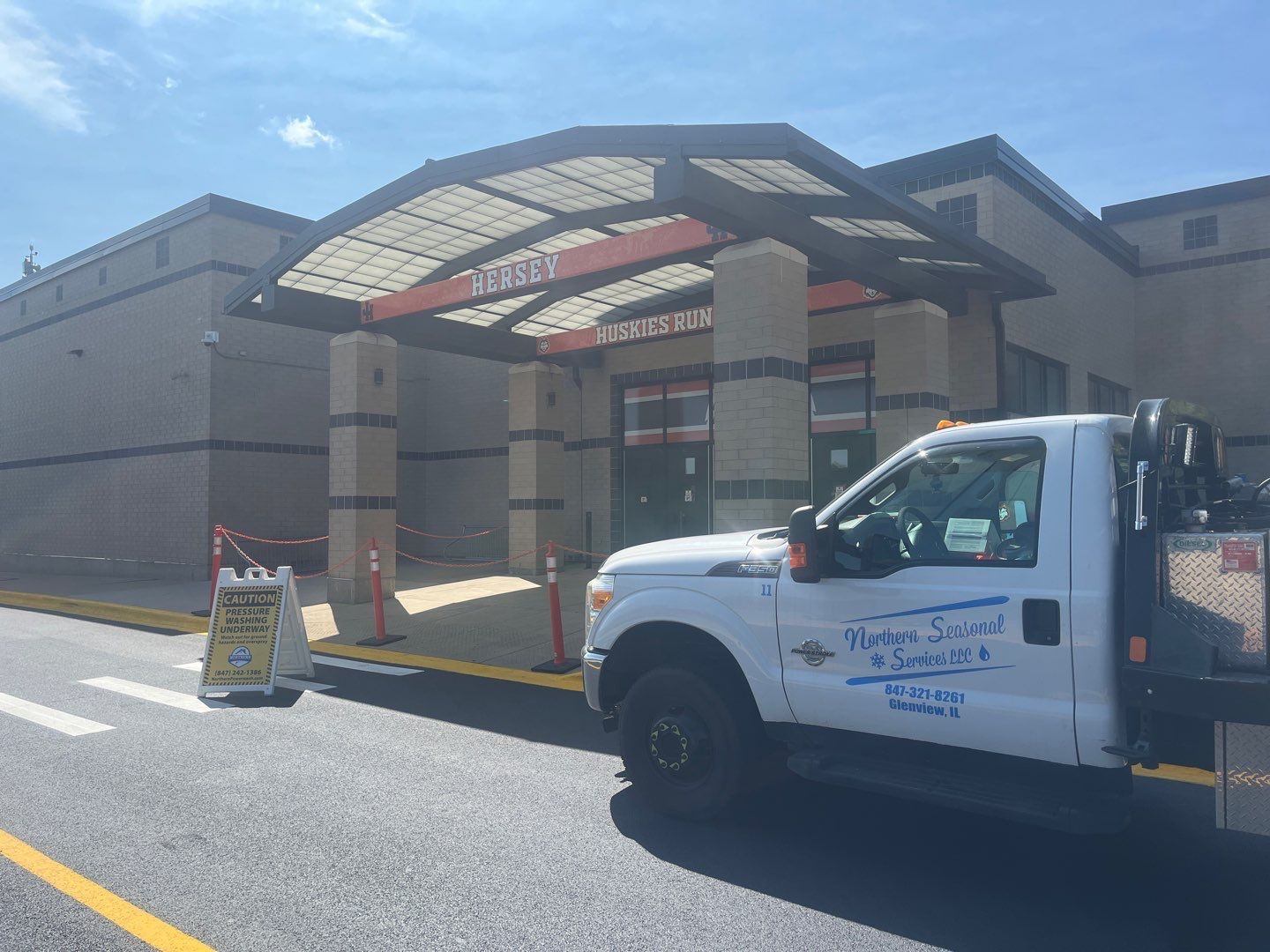 commercial pressure washing using Algaecide, soft wash soap by Northern Power Washing LLC.