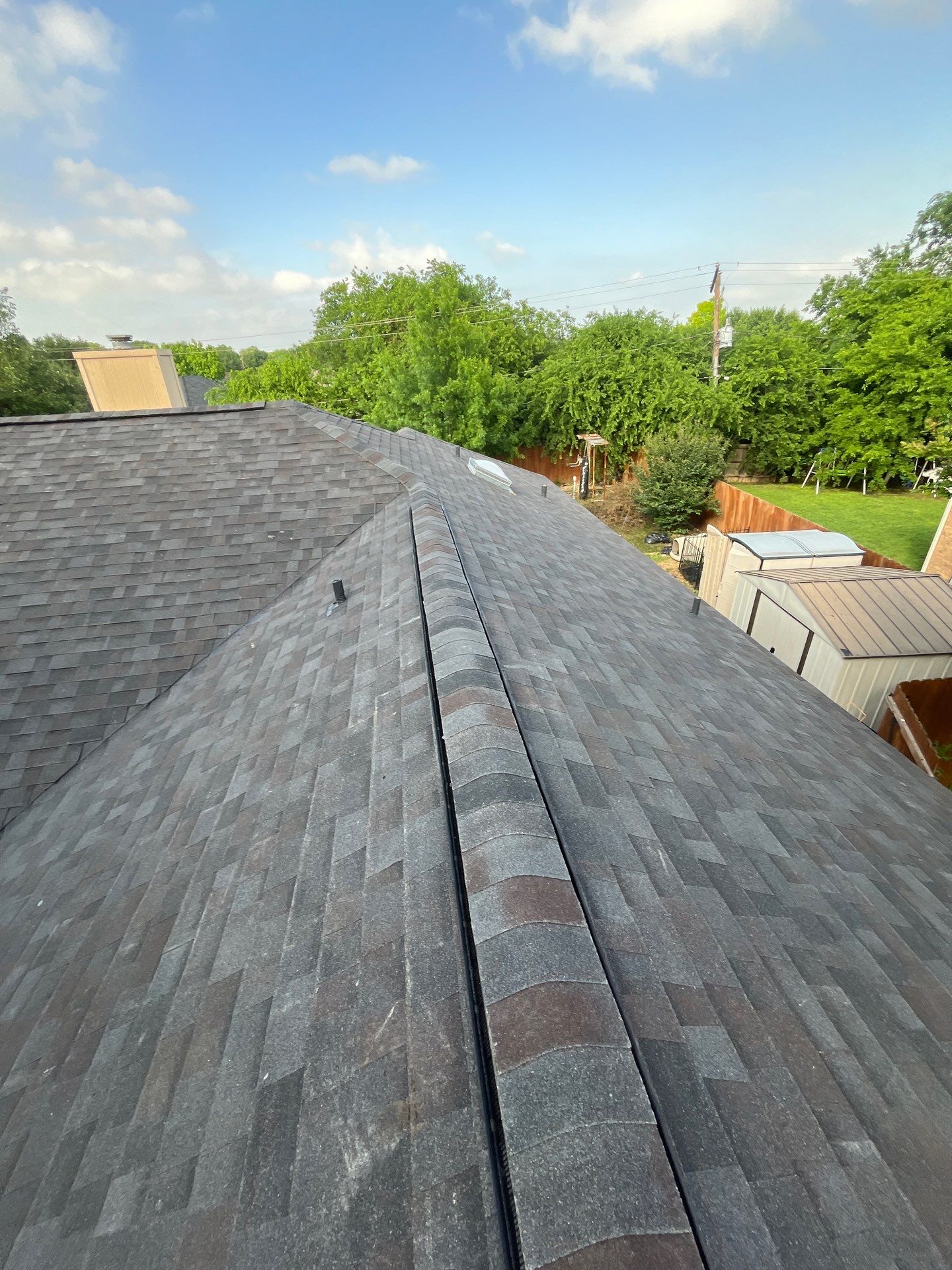 New Sky light/ New Roof/ Gutters and Fence Staining.  by Berry Good Roofing 