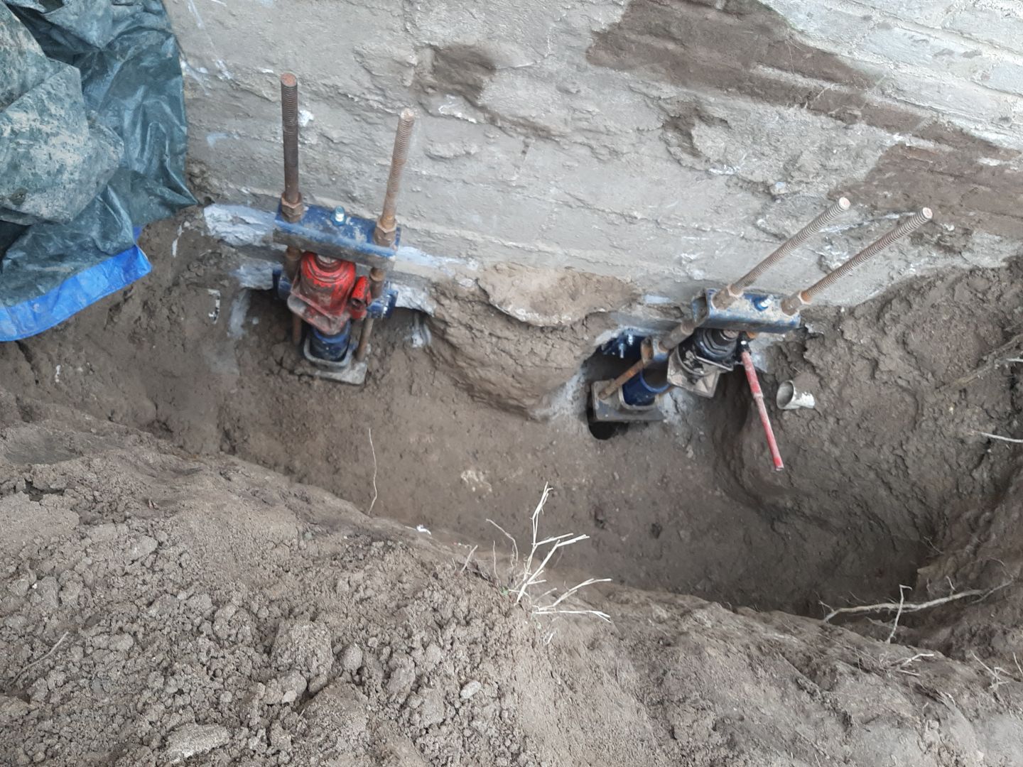 Helical Piers and Wall Crack Injections by Toledo Basement Repair