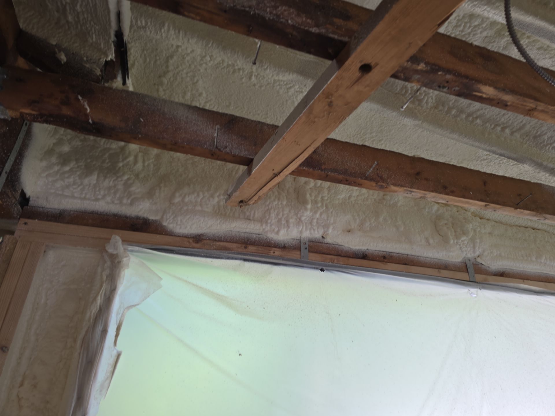 Attic Insulation using Closed Cell Spray Foam by NYS Foam & Energy