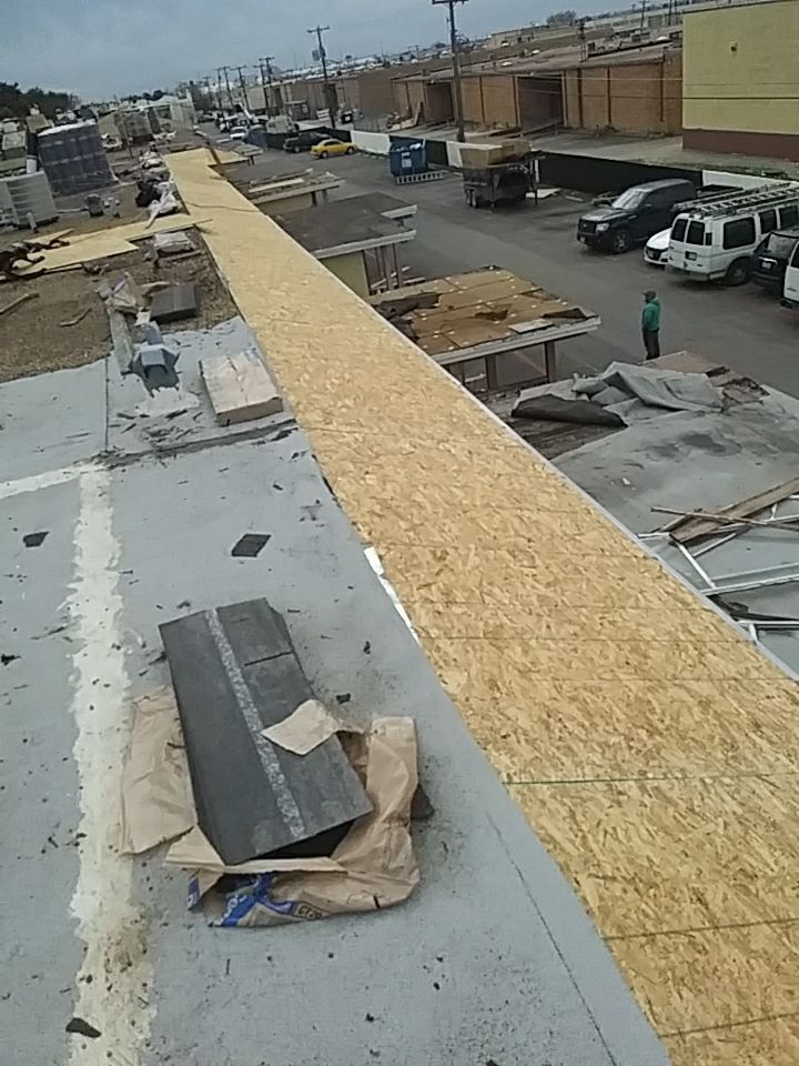 Apartment Roof Replacement by First Out Roofing 