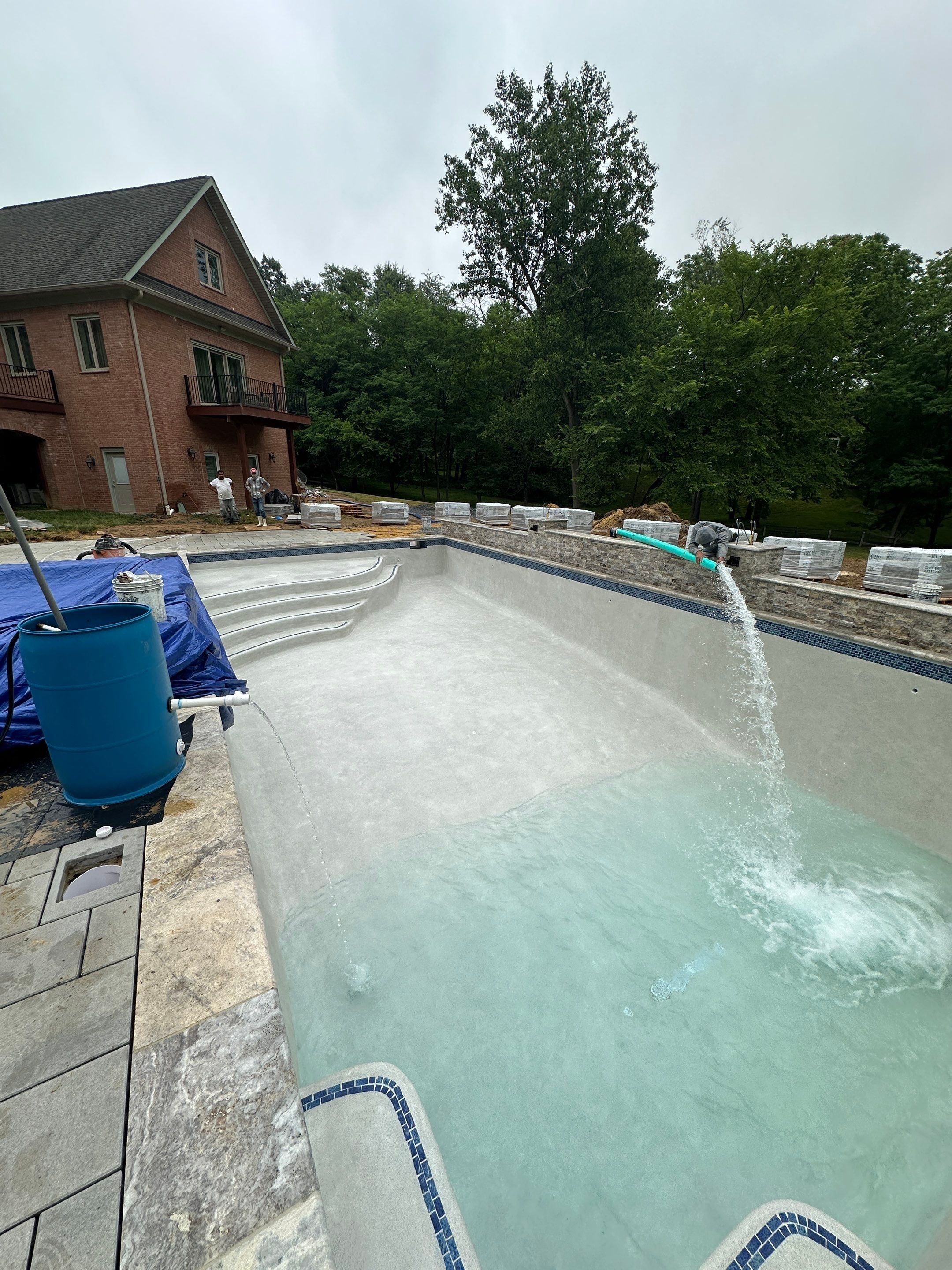 Gunite Pool w/ Spa and Water Features  by Elysium Pools