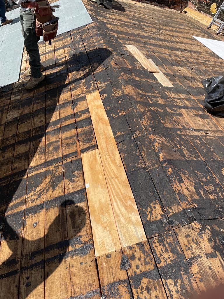 Commercial Roofing Installation using Conklin BenchPly system with PUMA top coat (imbedded fabric system) by Straight Edge Roofing Inc