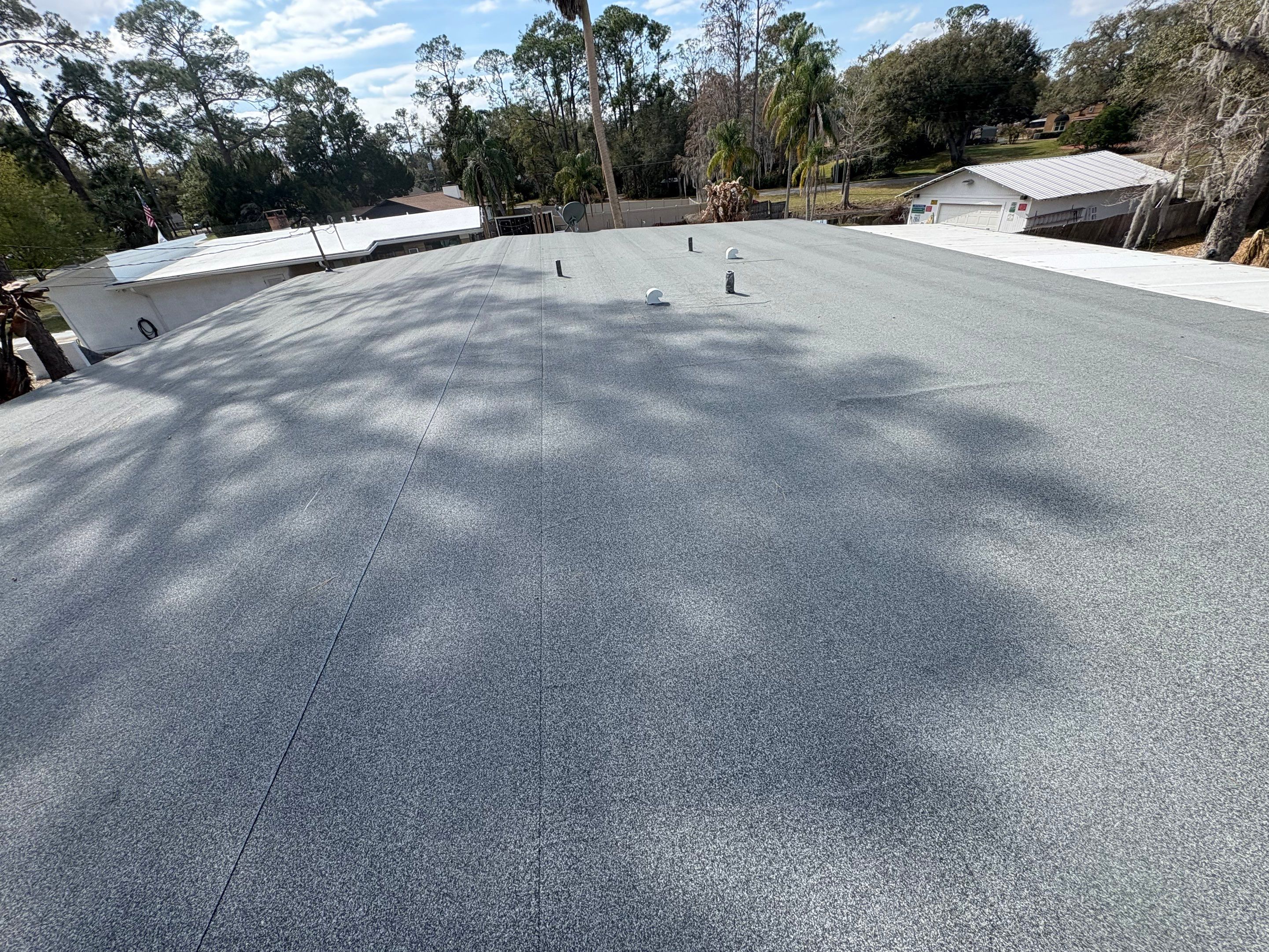 Modified Bitumen Reroof Replacement Sanford FL by Pinnacle Roofing Group