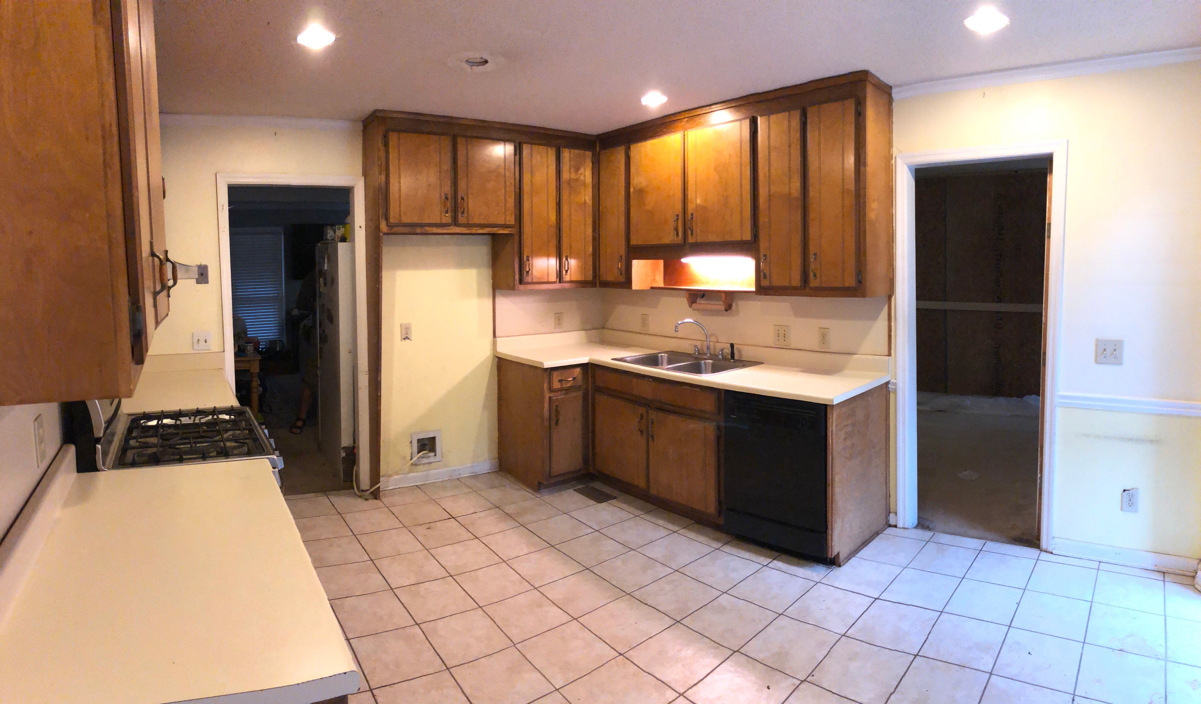 Open Concept Kitchen Remodel With White Shaker Cabinets in Kennesaw by Swift Home Renovations