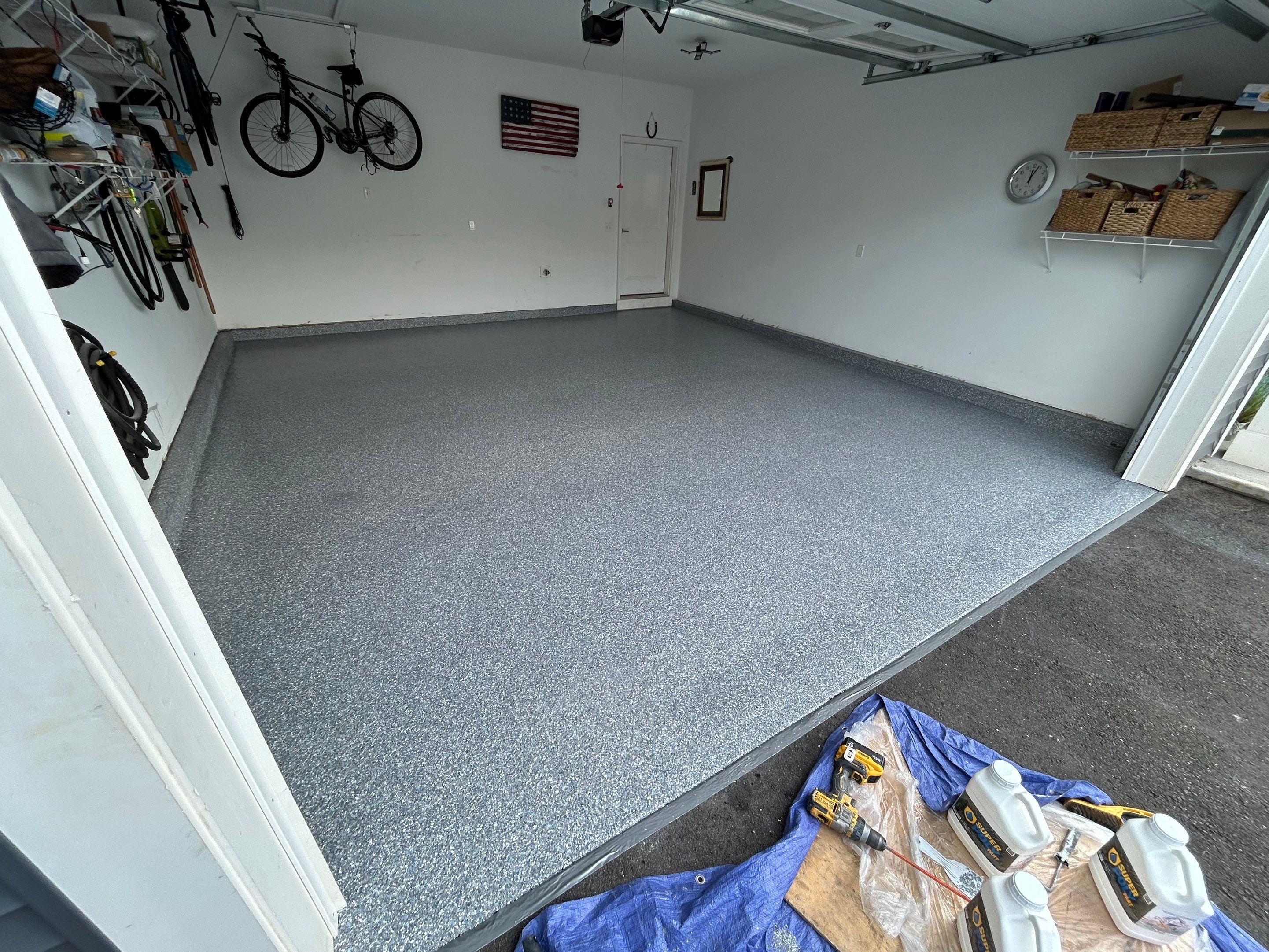 Garage Floor Coating Transformation by DiGiorgi Roofing and Siding Inc