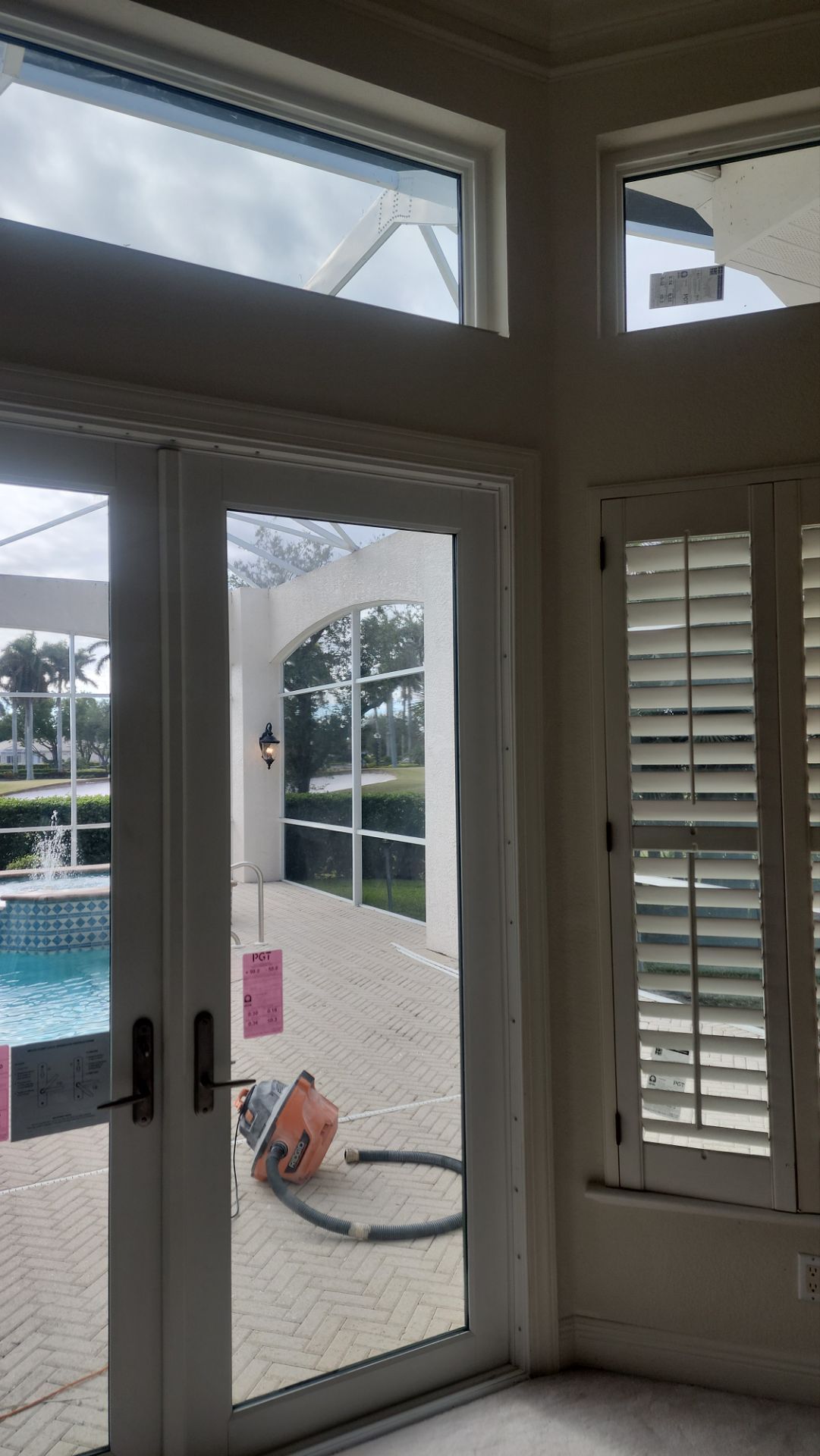 Window Installation using PGT Vinyl White-Bronze by Windows For Life 